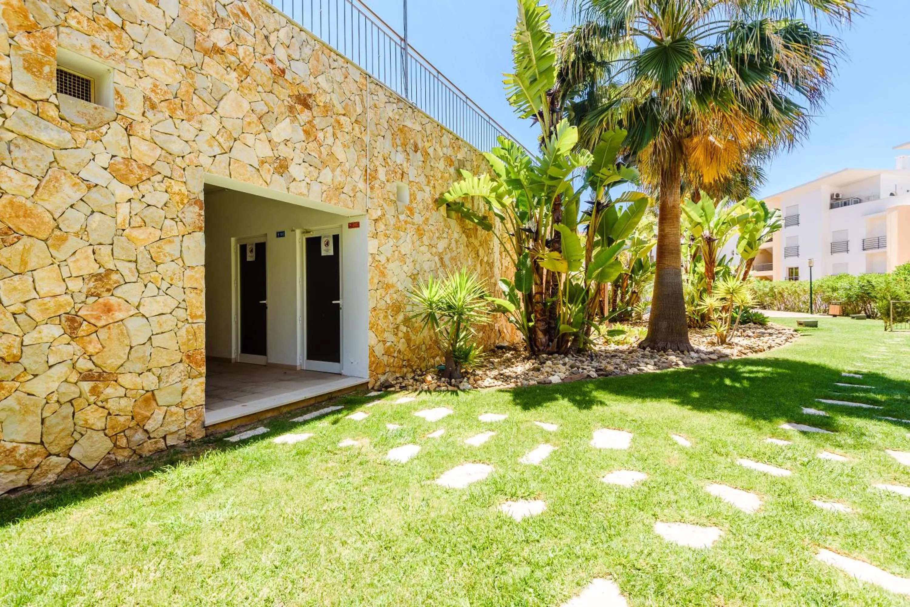 Garden in BnB Homes Ocean view Apartment with 3 spacious Terraces, 2 Swimming pools & Tennis court