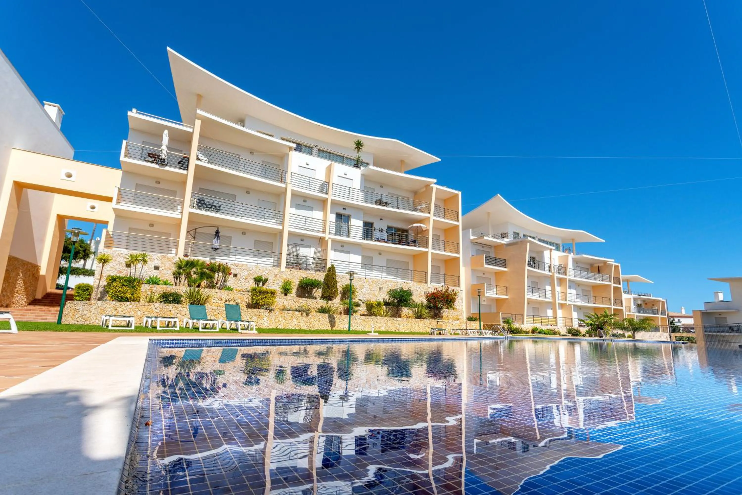 Property building in BnB Homes Ocean view Apartment with 3 spacious Terraces, 2 Swimming pools & Tennis court