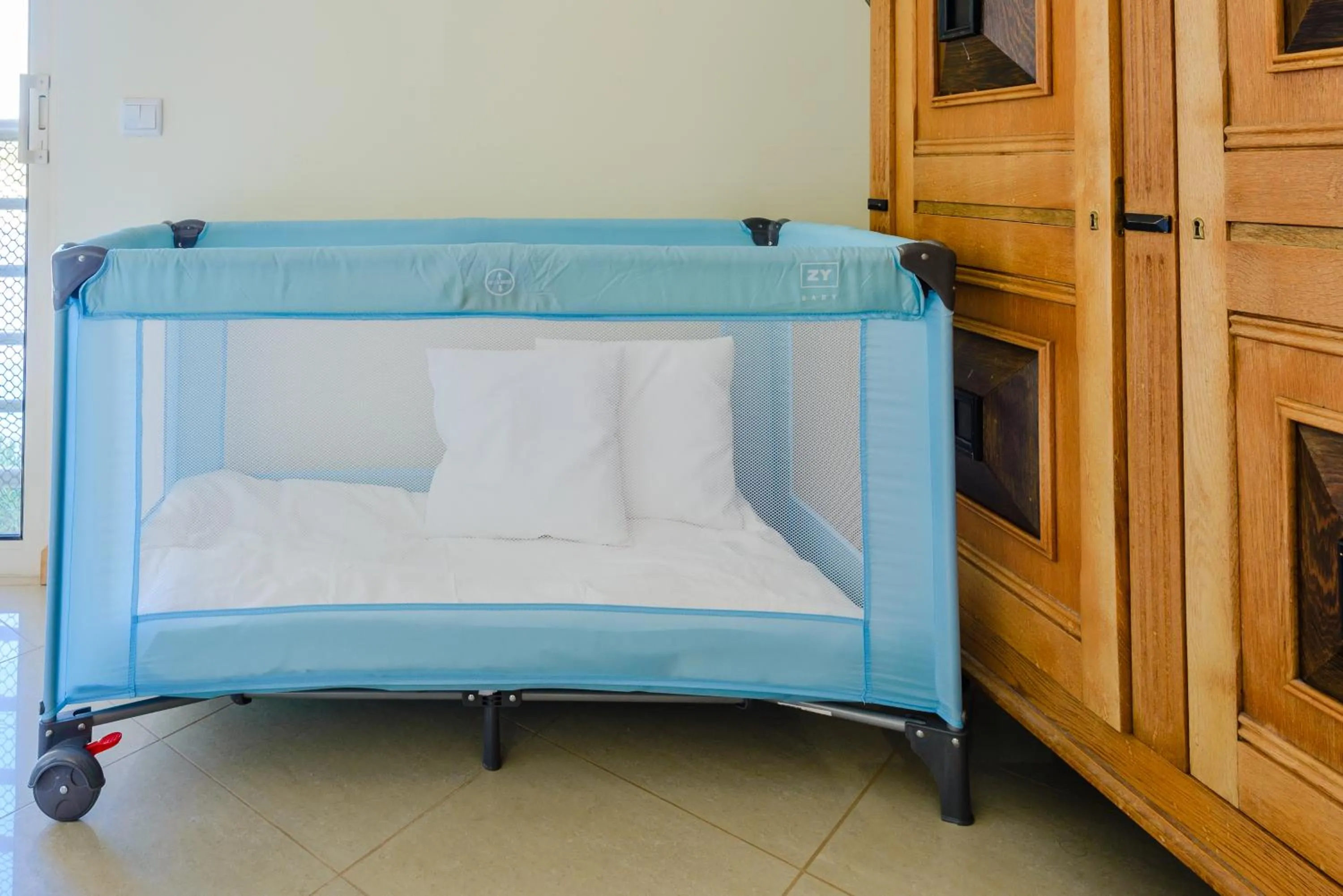 cot, Bed in BnB Homes Ocean view Apartment with 3 spacious Terraces, 2 Swimming pools & Tennis court