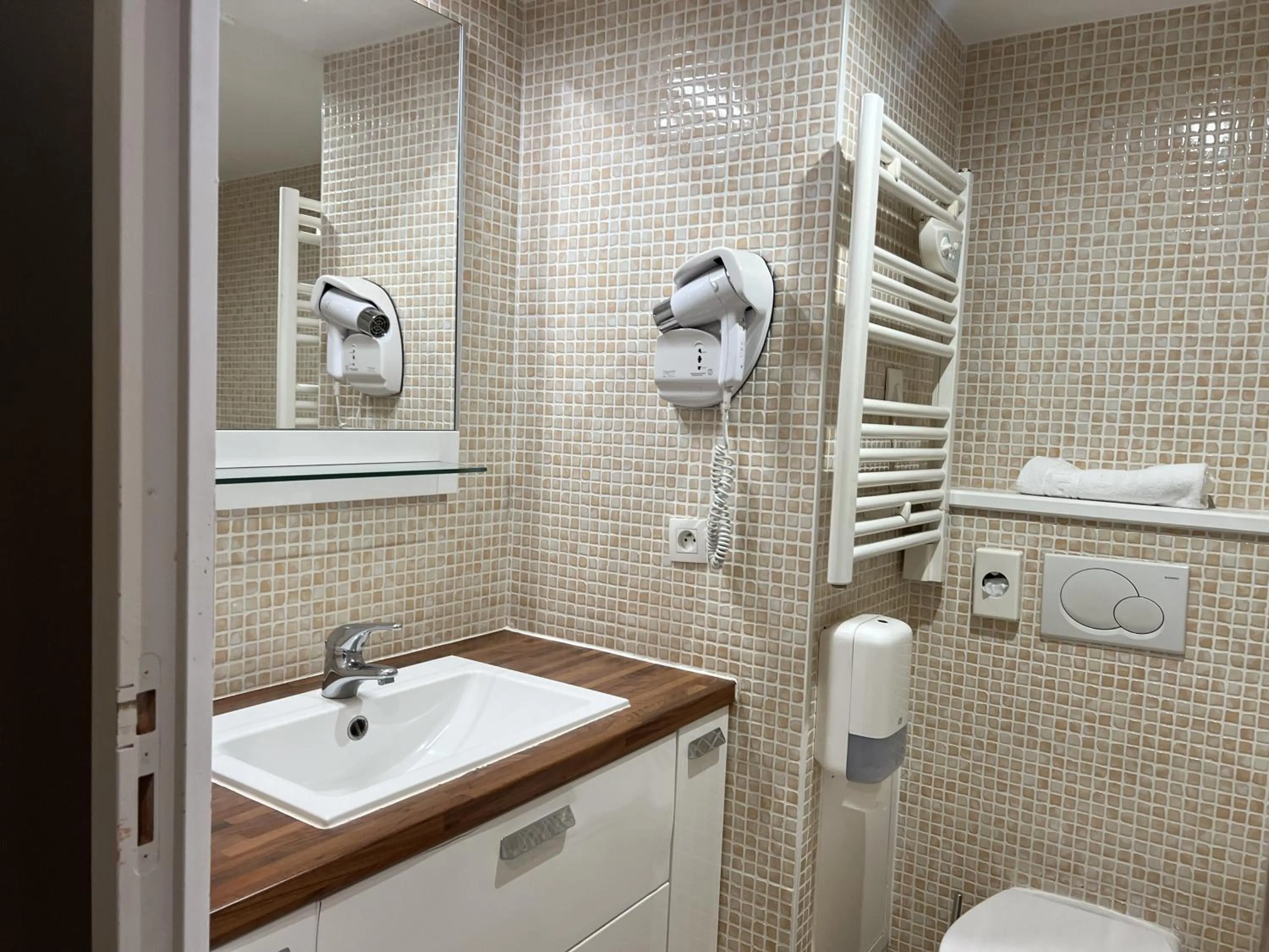 Toilet in La Loggia Appart'Hôtel & Spa