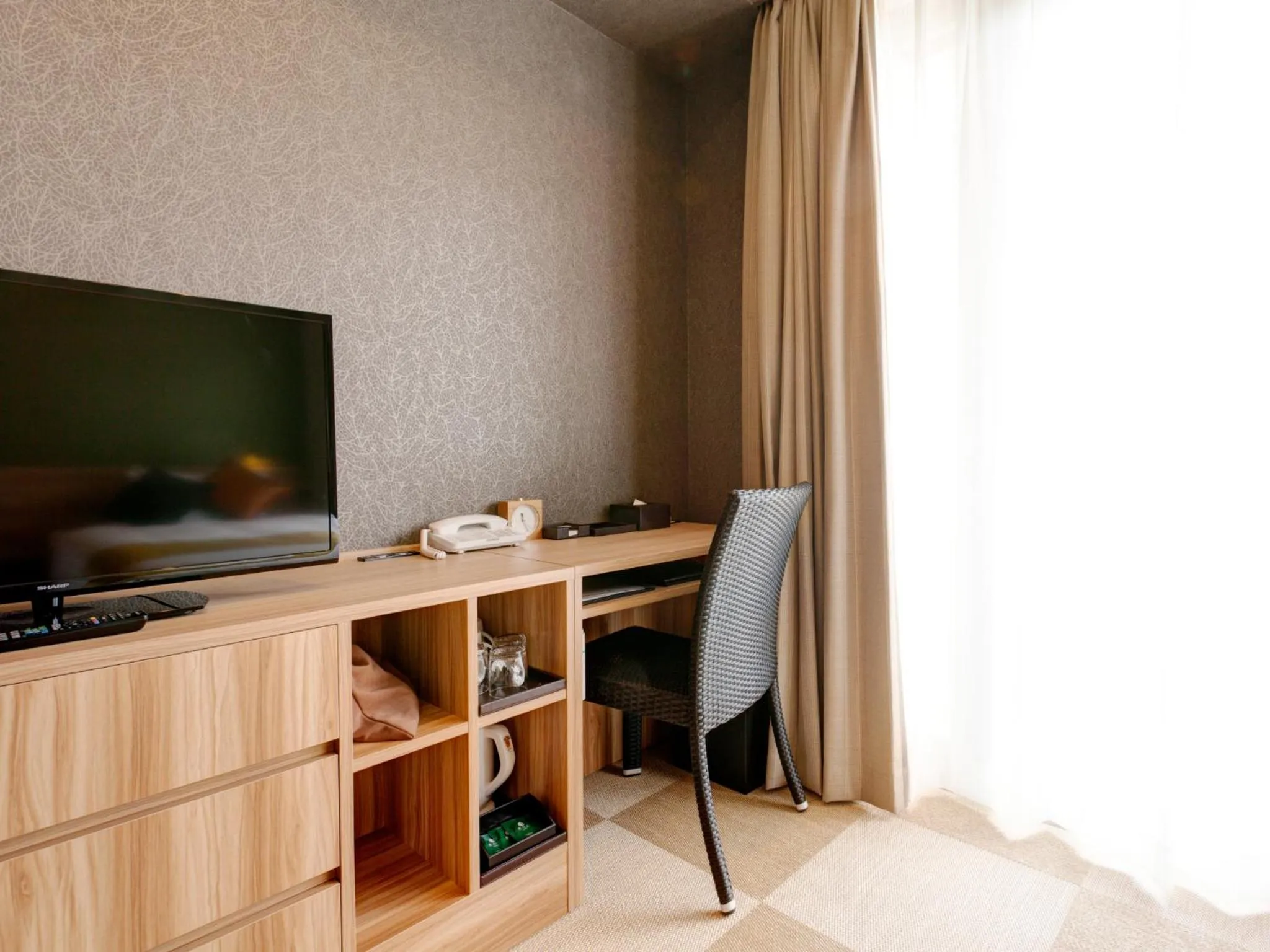 Photo of the whole room in Community & Spa Naha Central Hotel