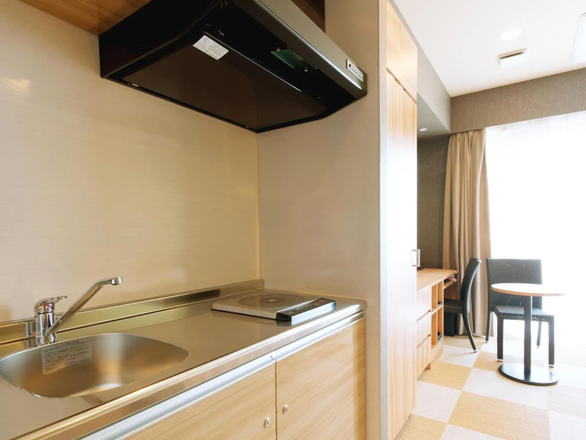 Kitchen or kitchenette in Community & Spa Naha Central Hotel