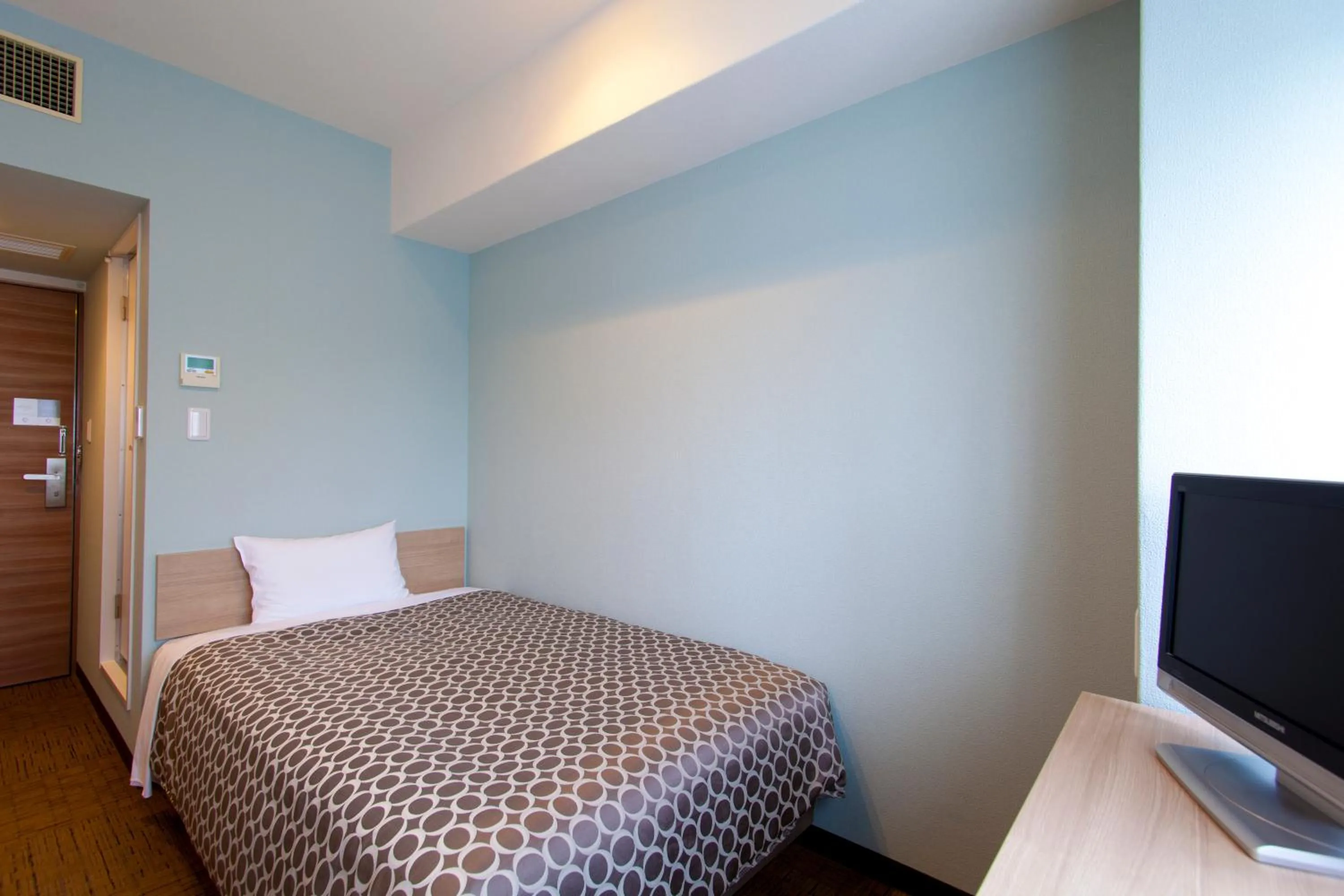 Photo of the whole room, Bed in Community & Spa Naha Central Hotel