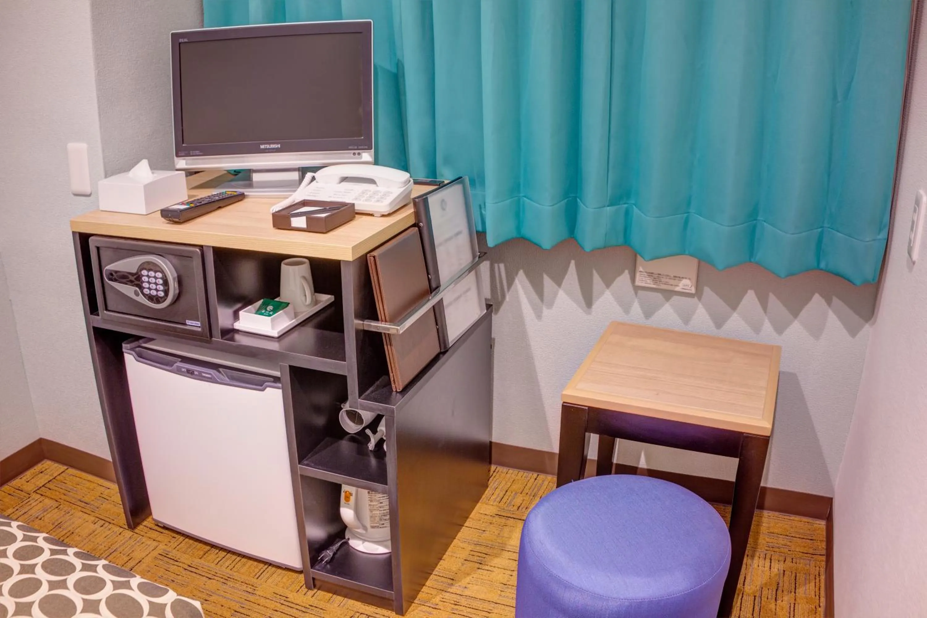 Photo of the whole room in Community & Spa Naha Central Hotel