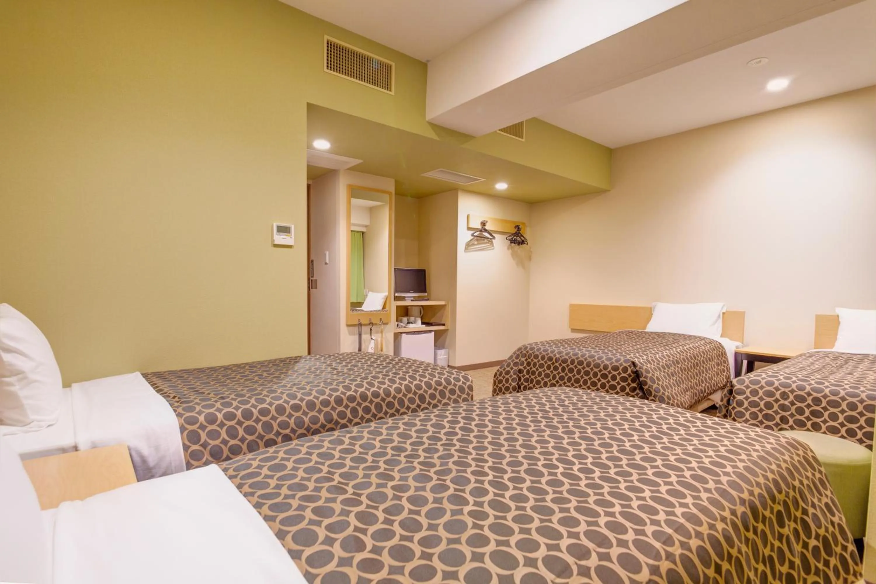 Photo of the whole room, Bed in Community & Spa Naha Central Hotel