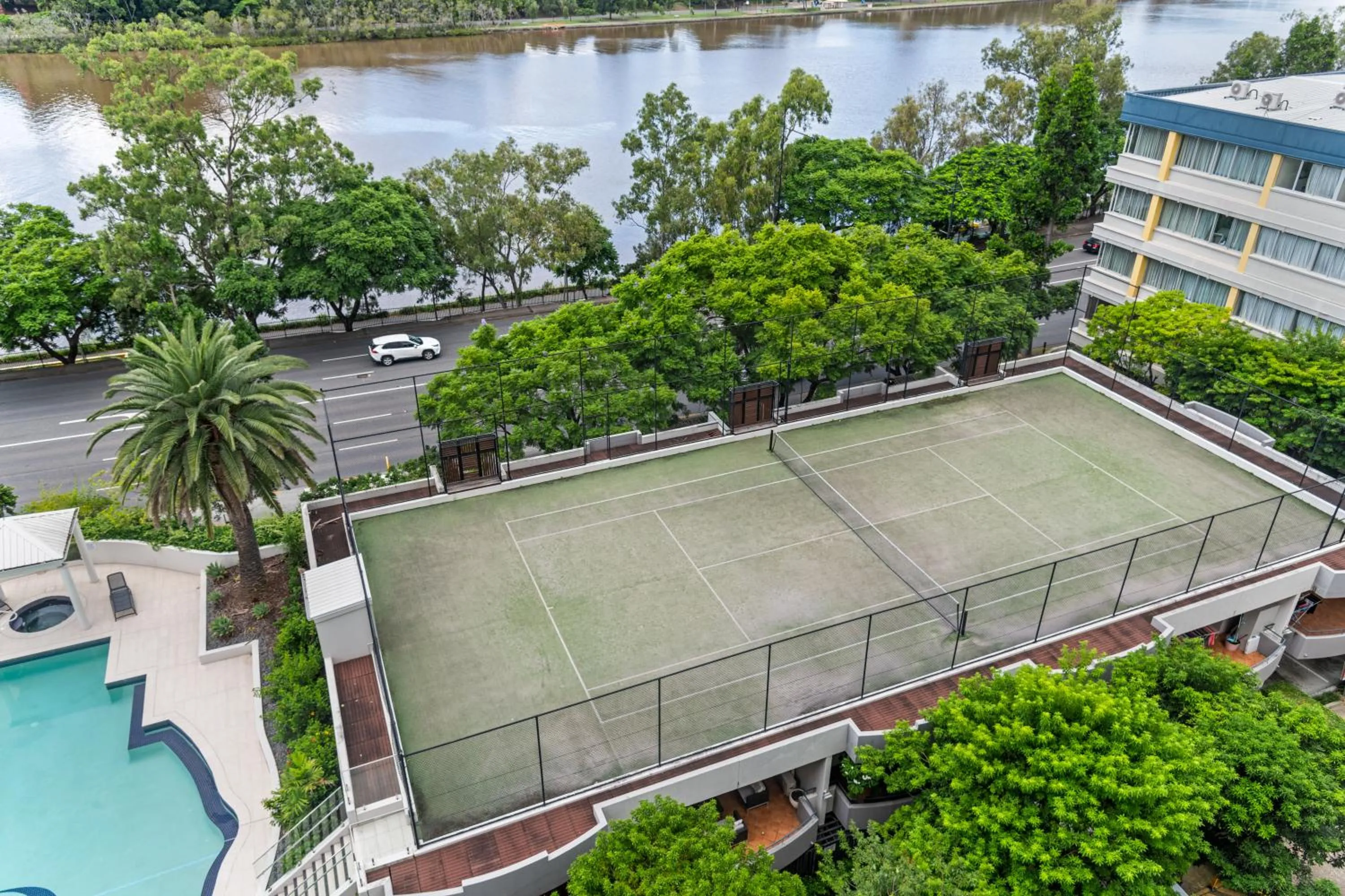 Tennis court in The Oasis Apartments
