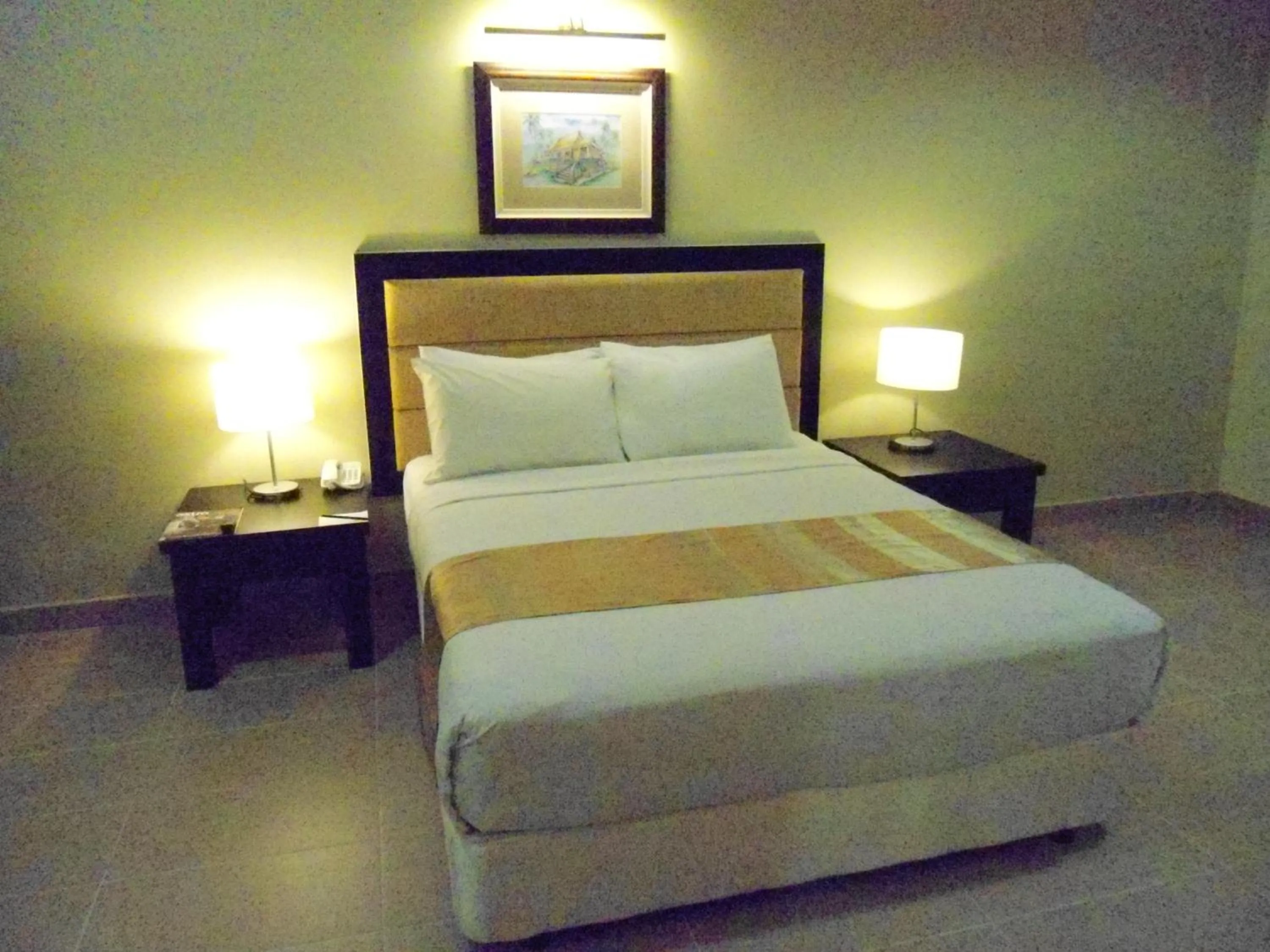Bed in Puteri Bay Hotel