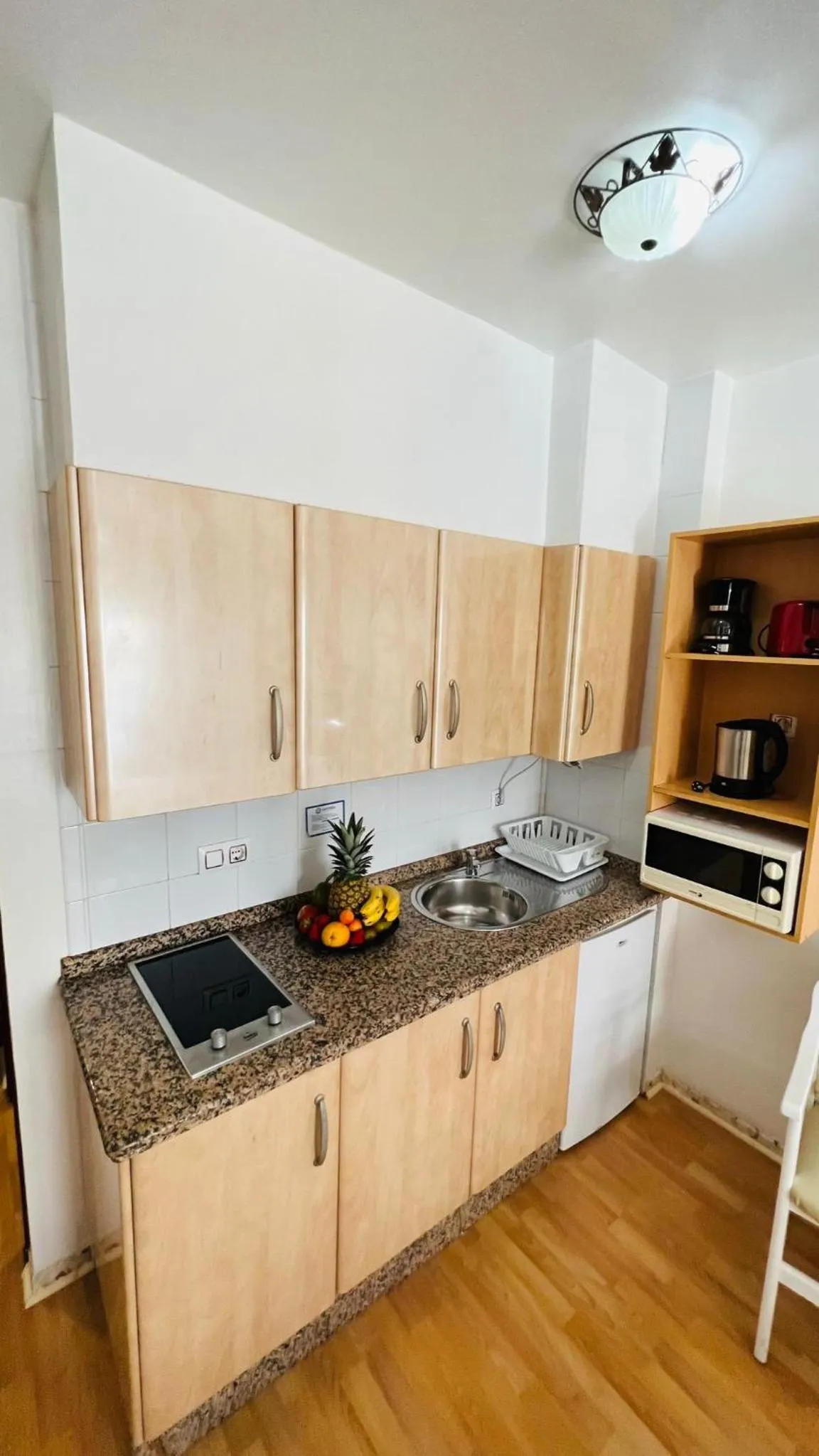 Kitchen or kitchenette in Candisol Cozy Inns