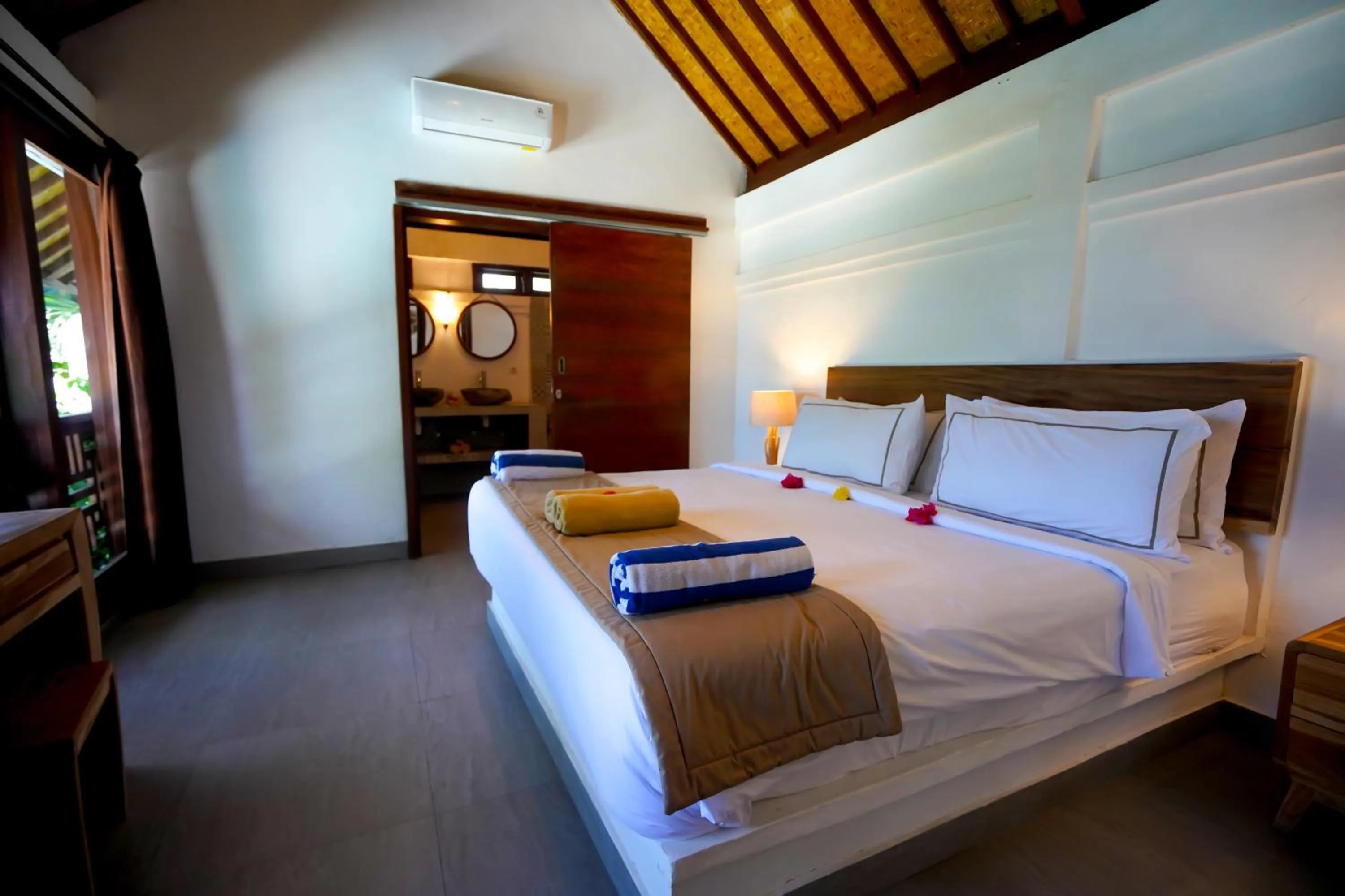 Bed in Marygio Gili Resort