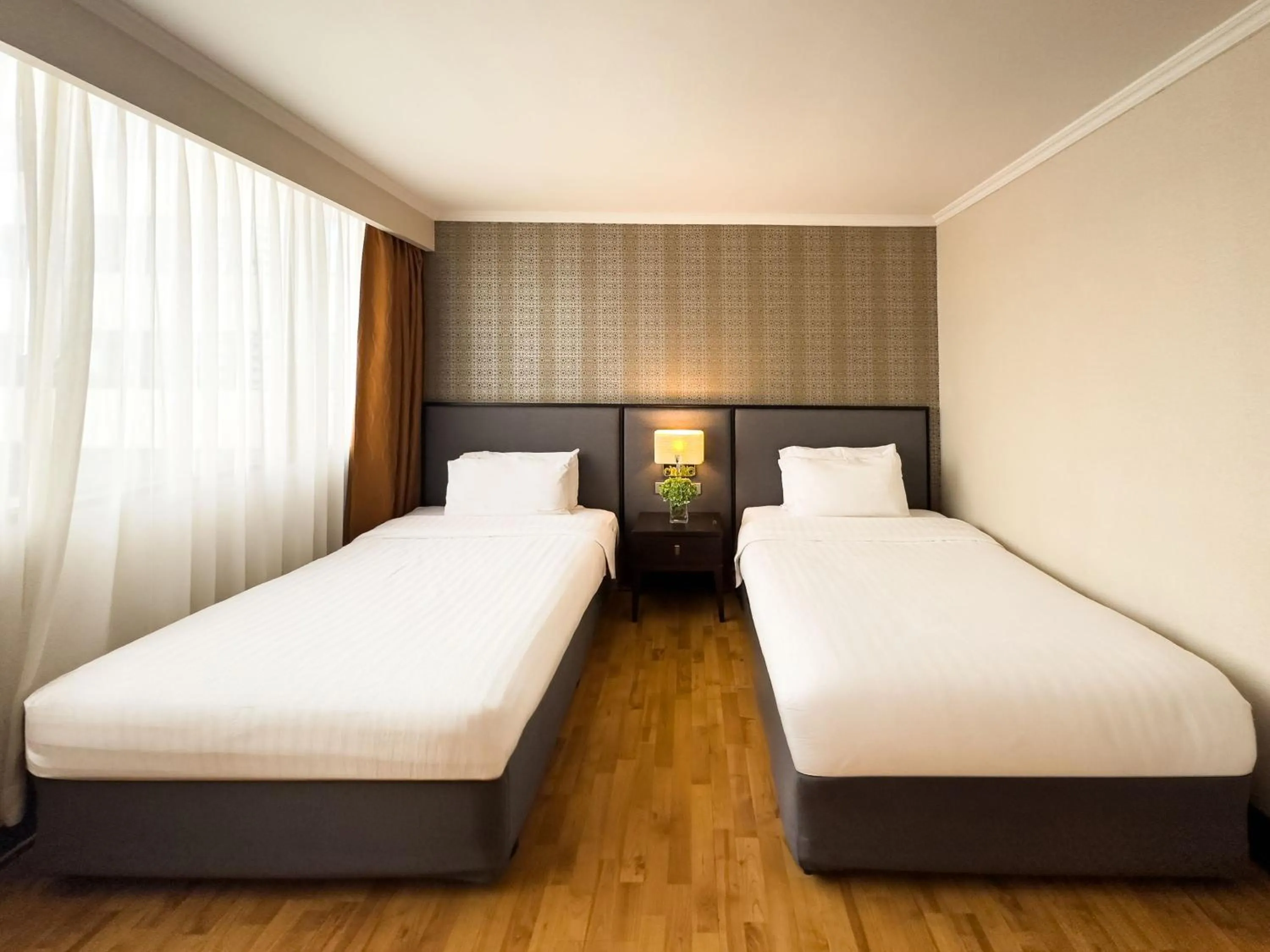 Bed in Rembrandt Residences Bangkok