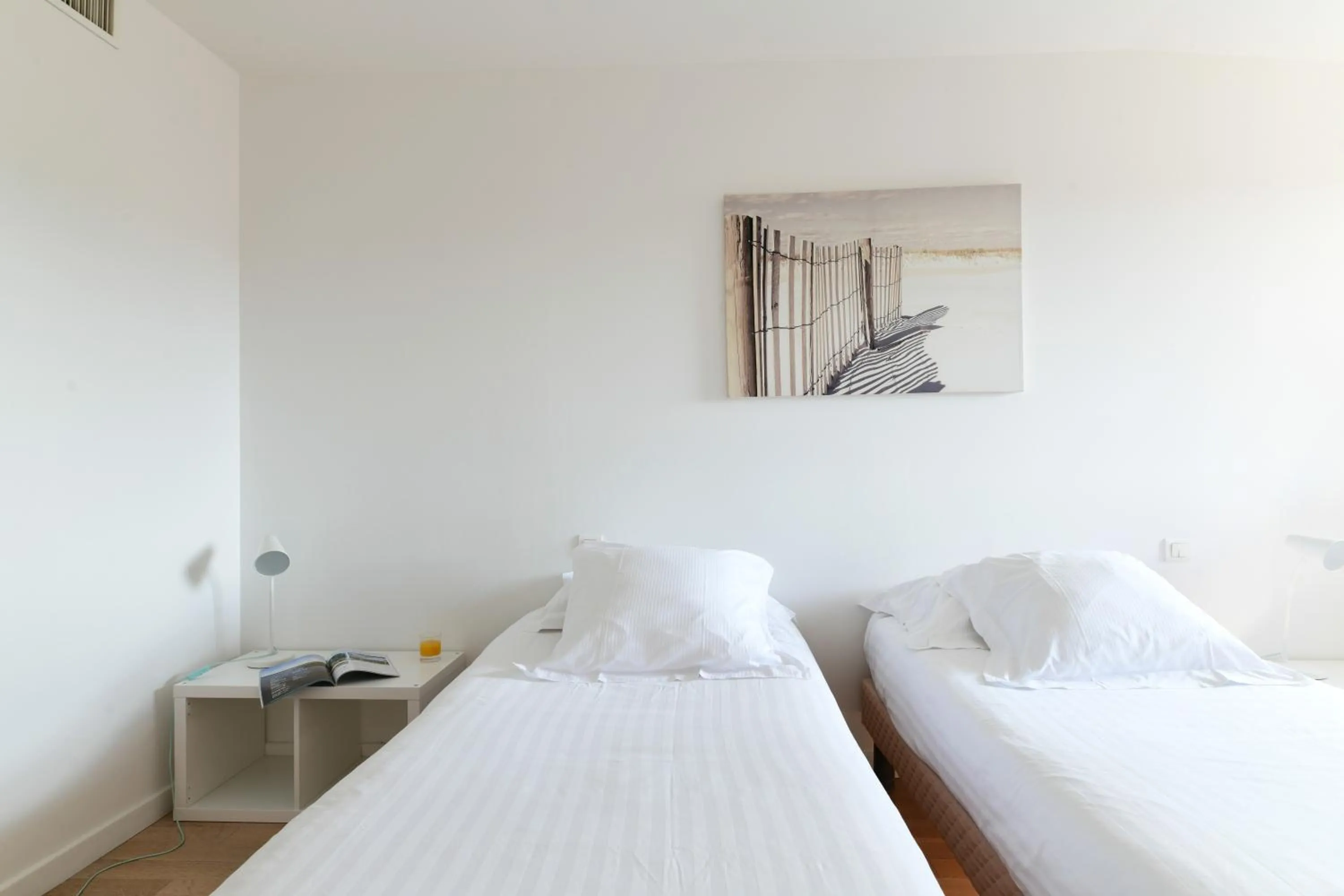 Bed in Hotel Le Pavillon Bleu