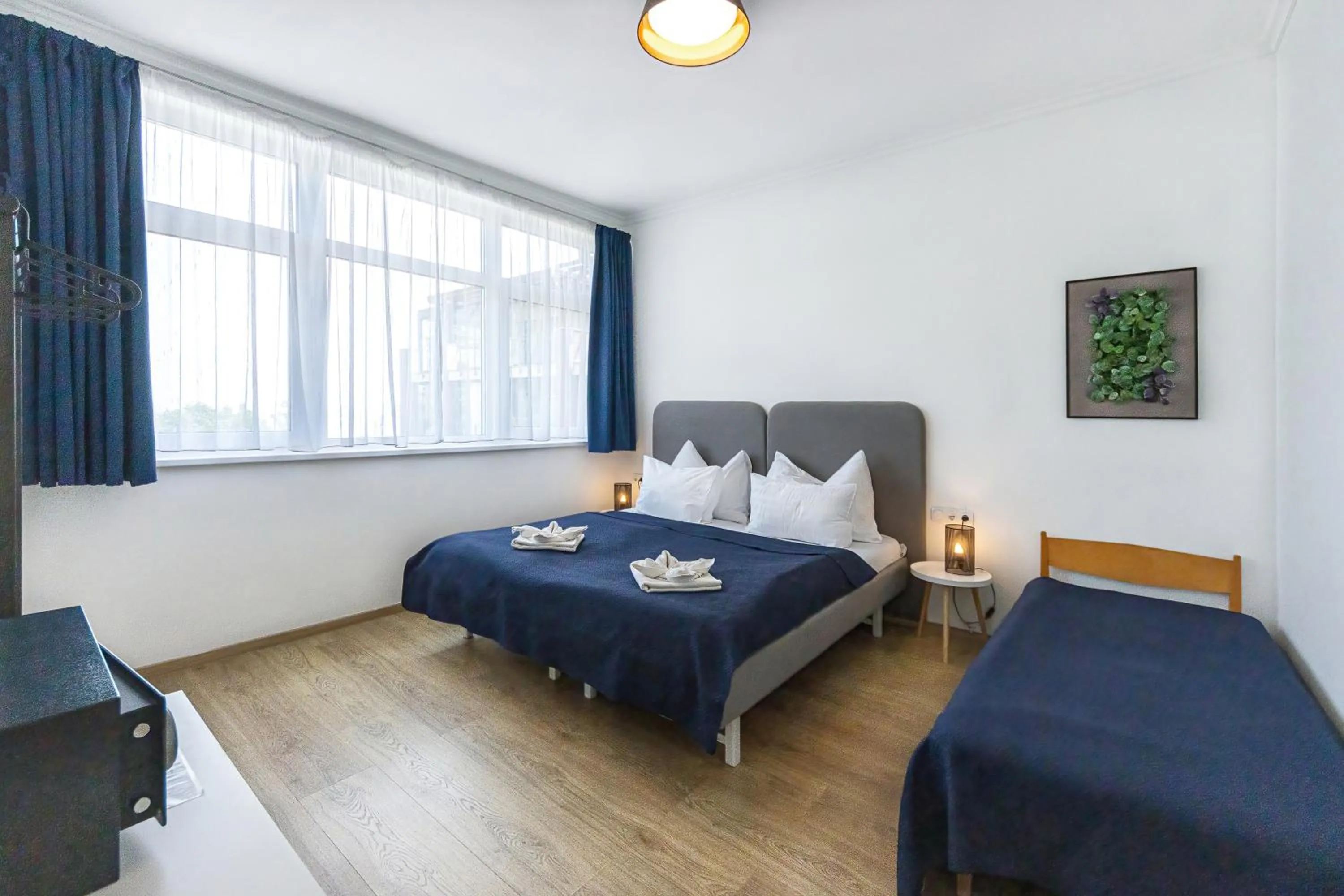 Bed in PLAGE-ON Panzió