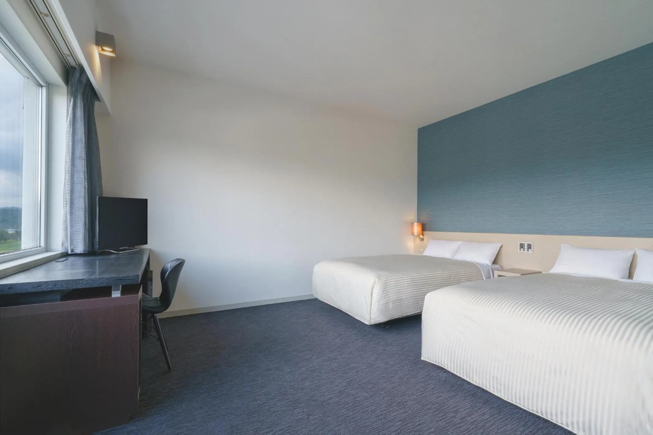 Photo of the whole room, Bed in Hotel Vista Kumamoto Airport