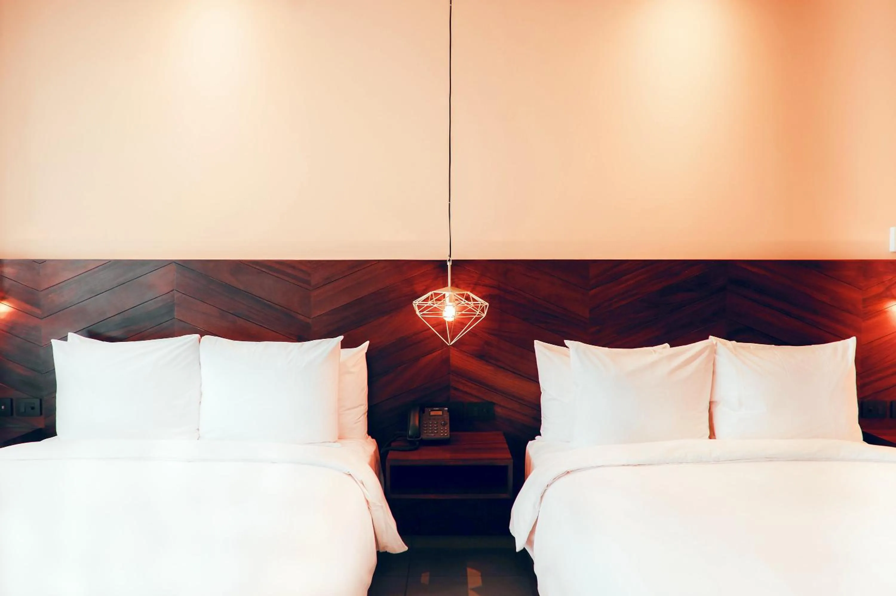 Bed in CALIXTA Hotel