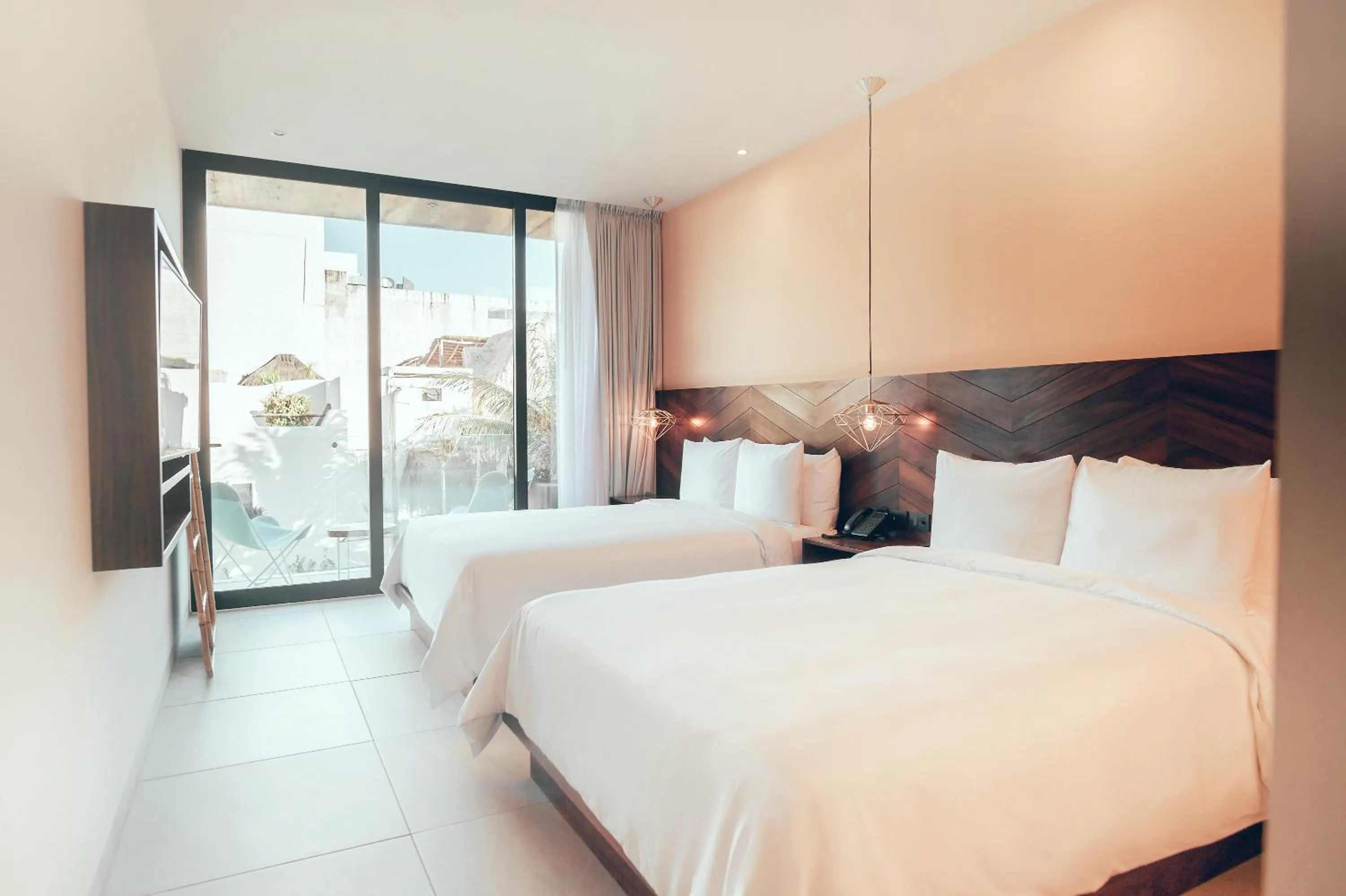 Bed in CALIXTA Hotel