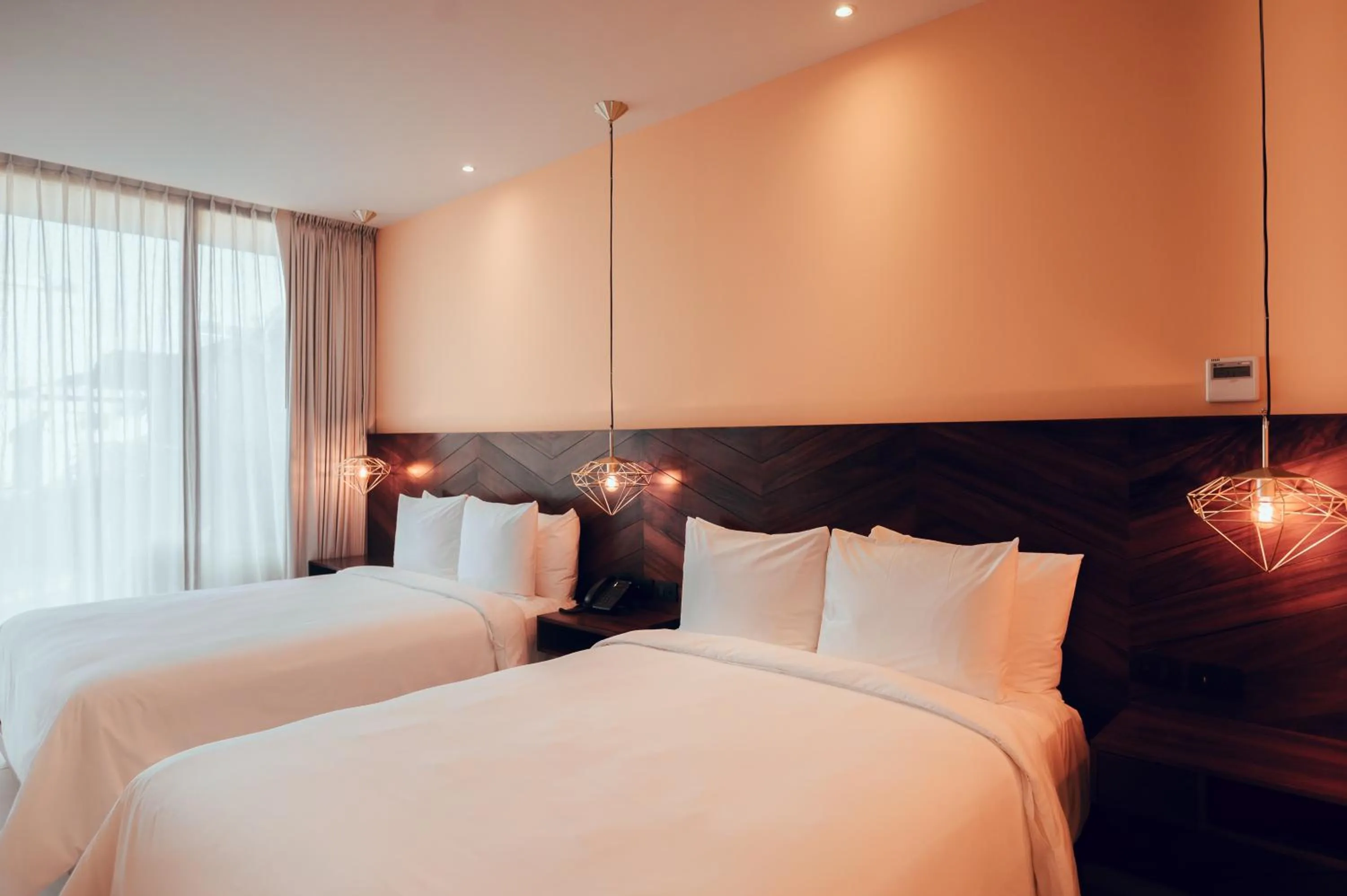 Bed in CALIXTA Hotel