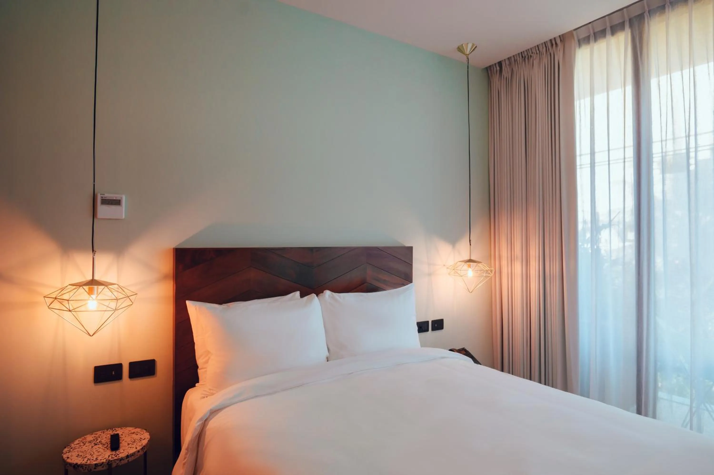 Bed in CALIXTA Hotel