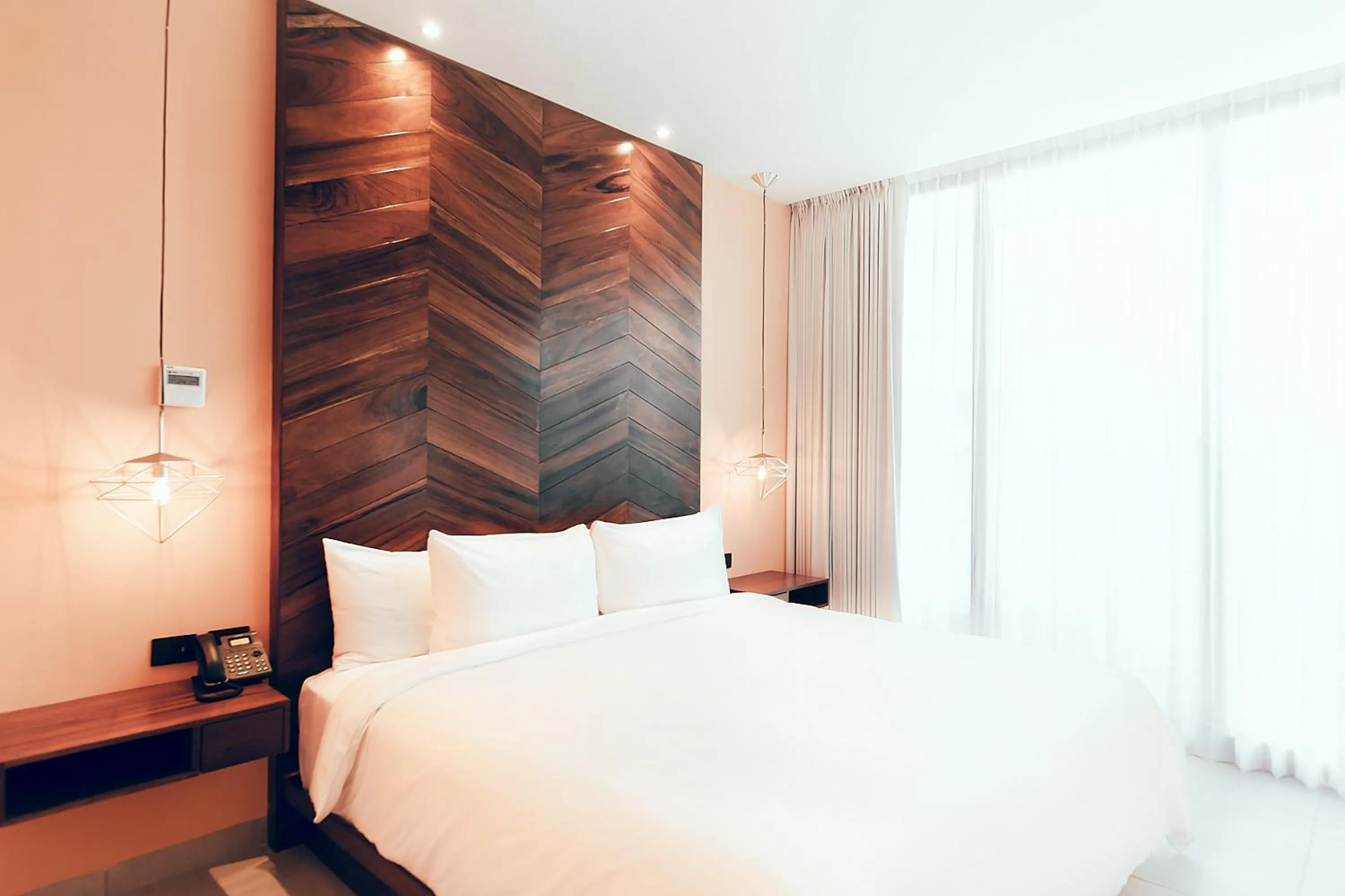 Bed in CALIXTA Hotel