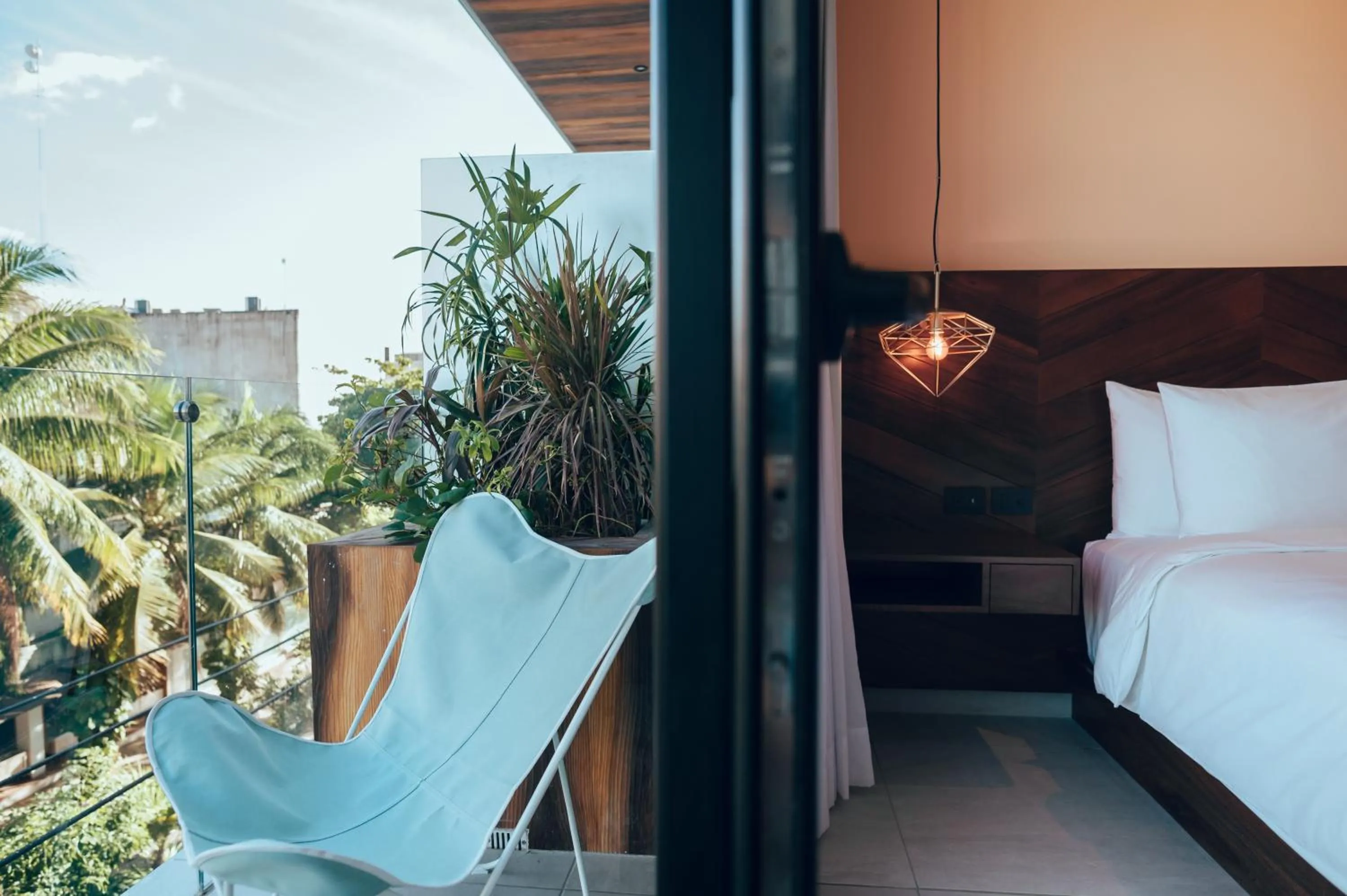 Balcony/Terrace, Bed in CALIXTA Hotel