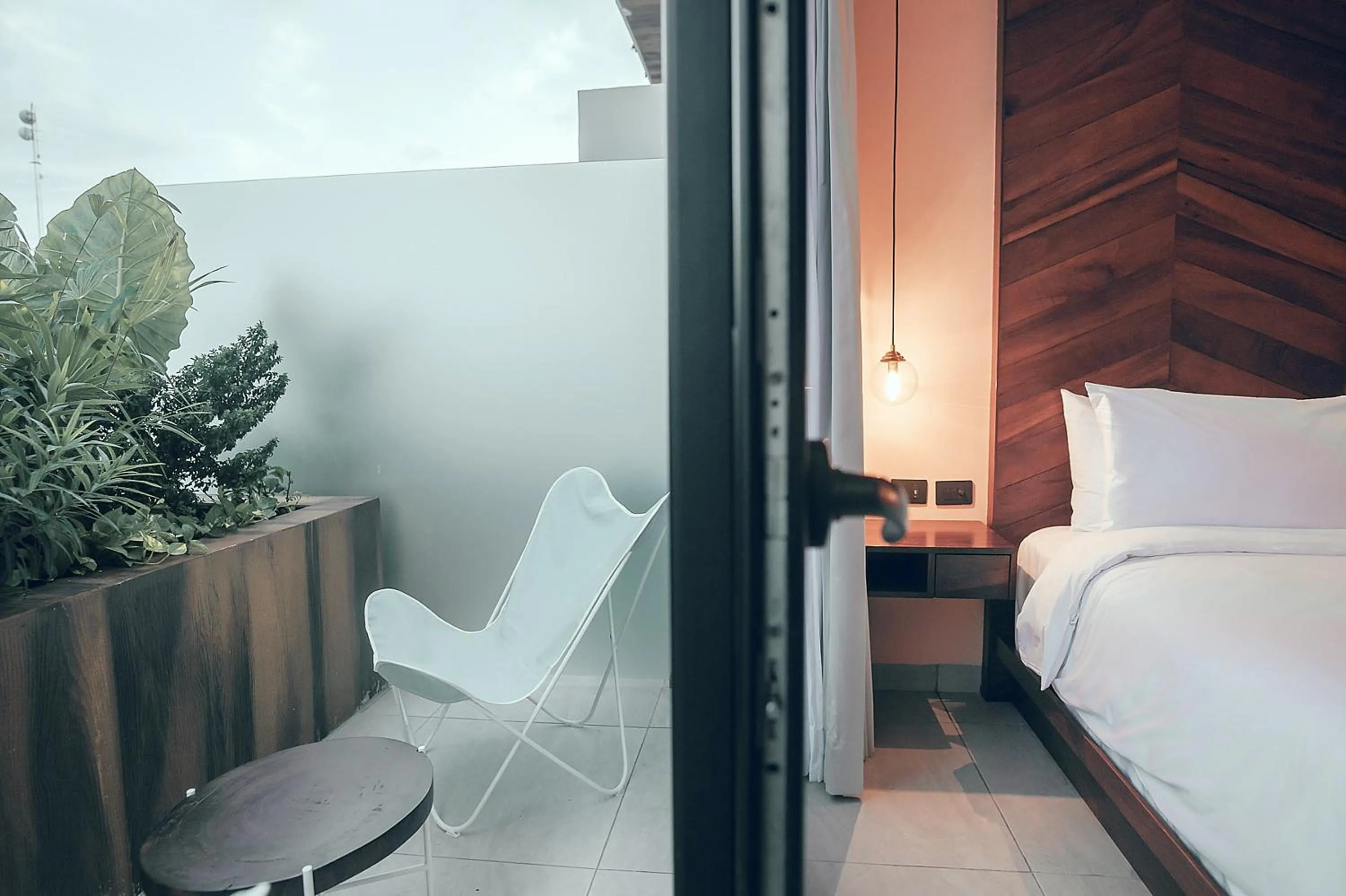 Balcony/Terrace, Bed in CALIXTA Hotel