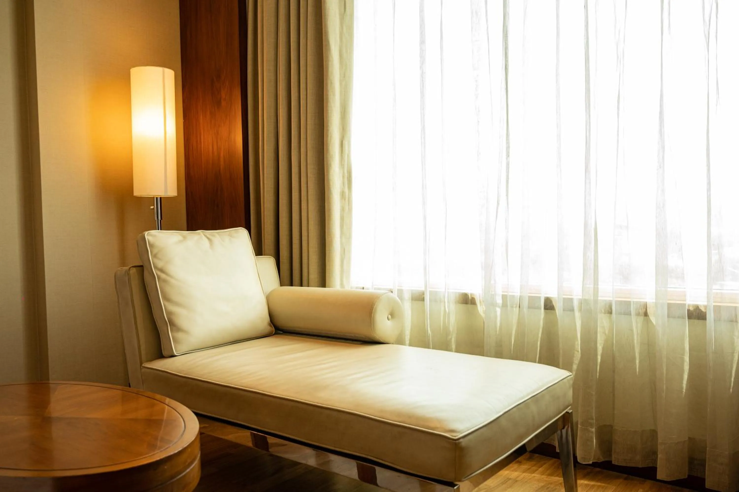 Seating area, Bed in DoubleTree by Hilton-Pune Chinchwad