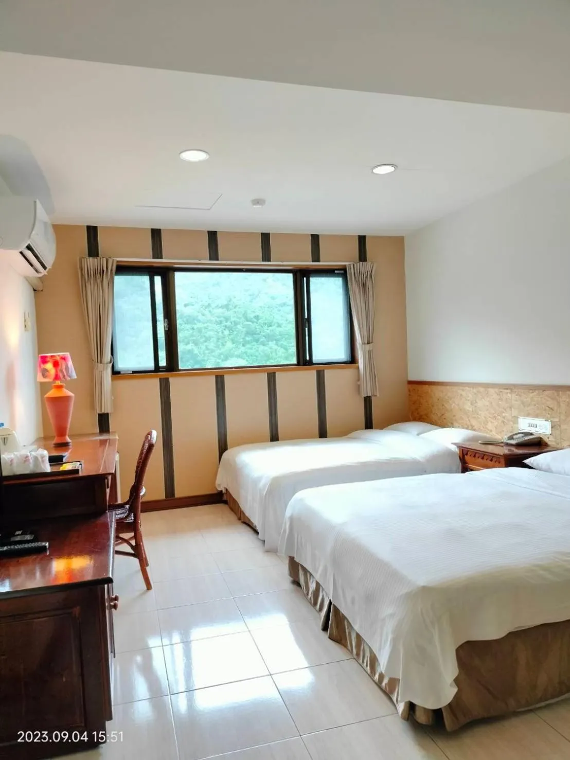 Bed in Rainbow Resort Hotel