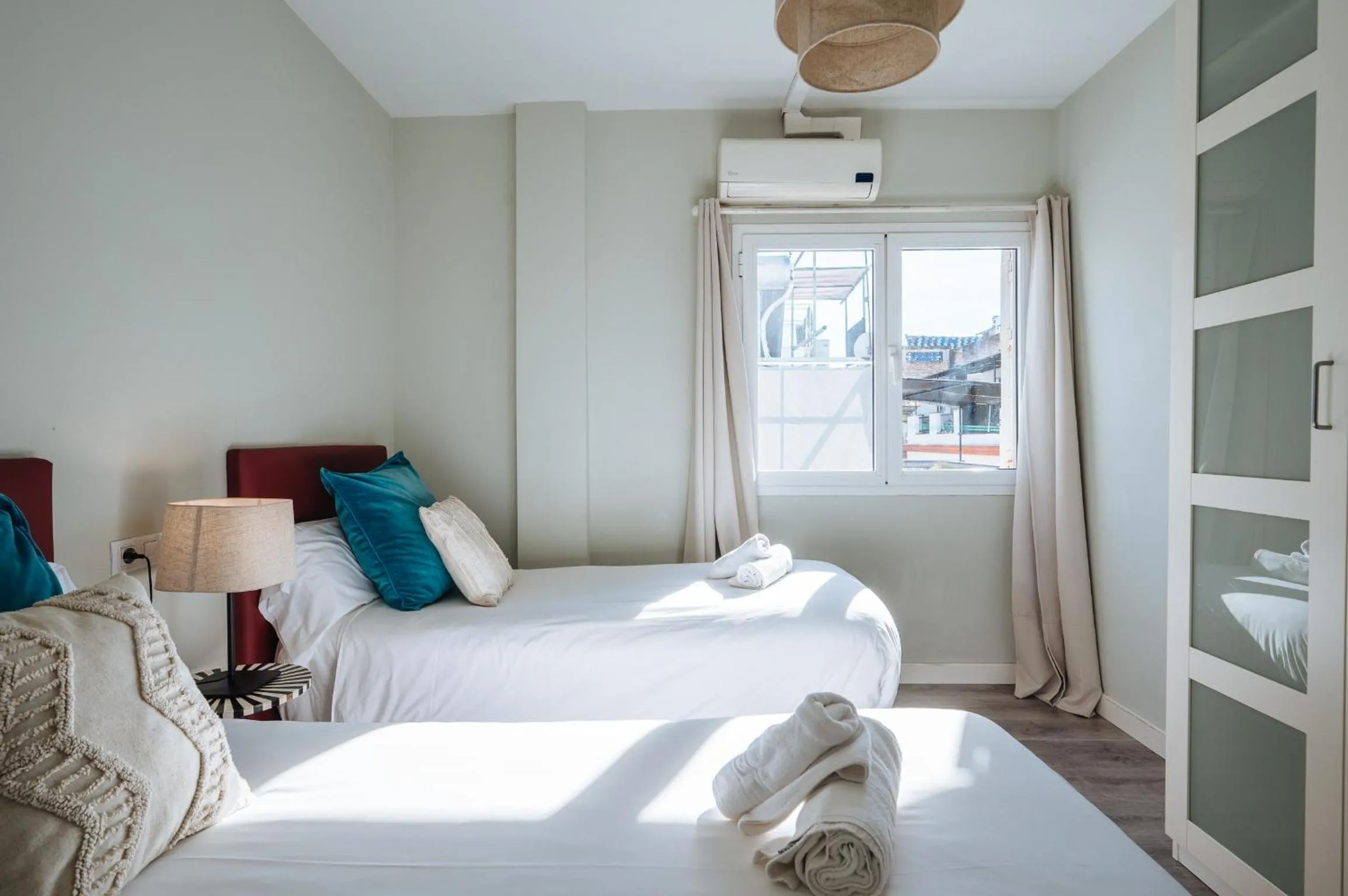 Bed in The Zentral Suites & Apartments