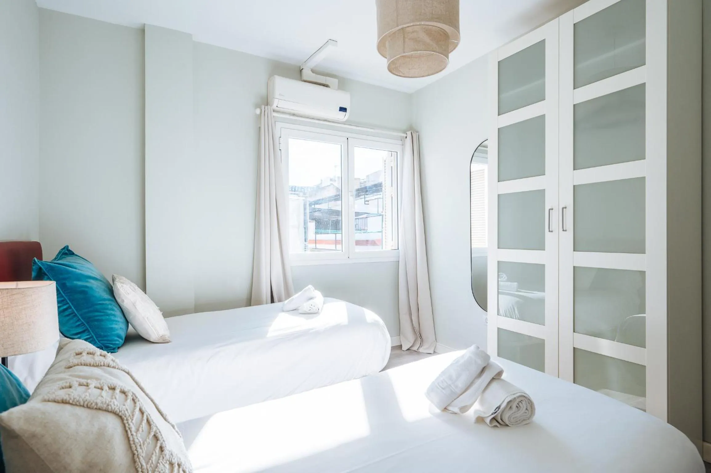 Bed in The Zentral Suites & Apartments