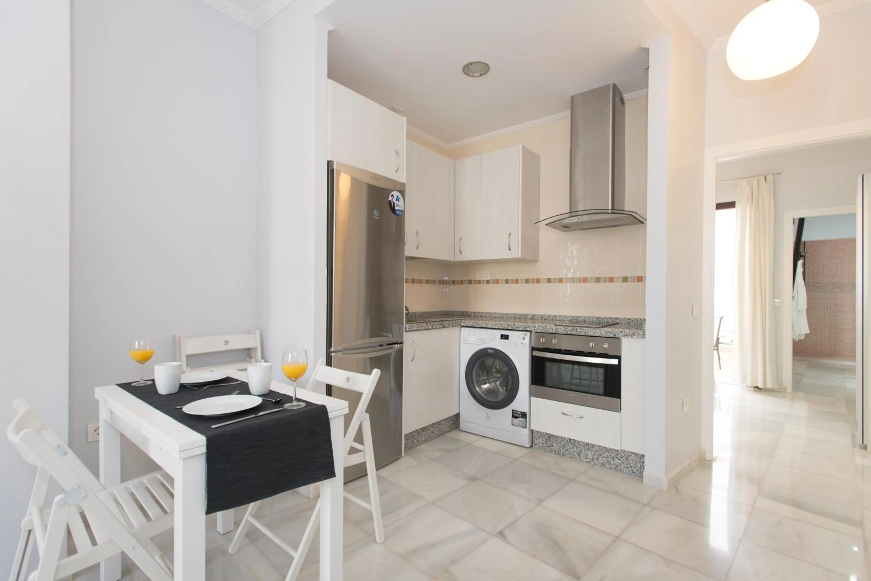 Kitchen or kitchenette in The Zentral Suites & Apartments