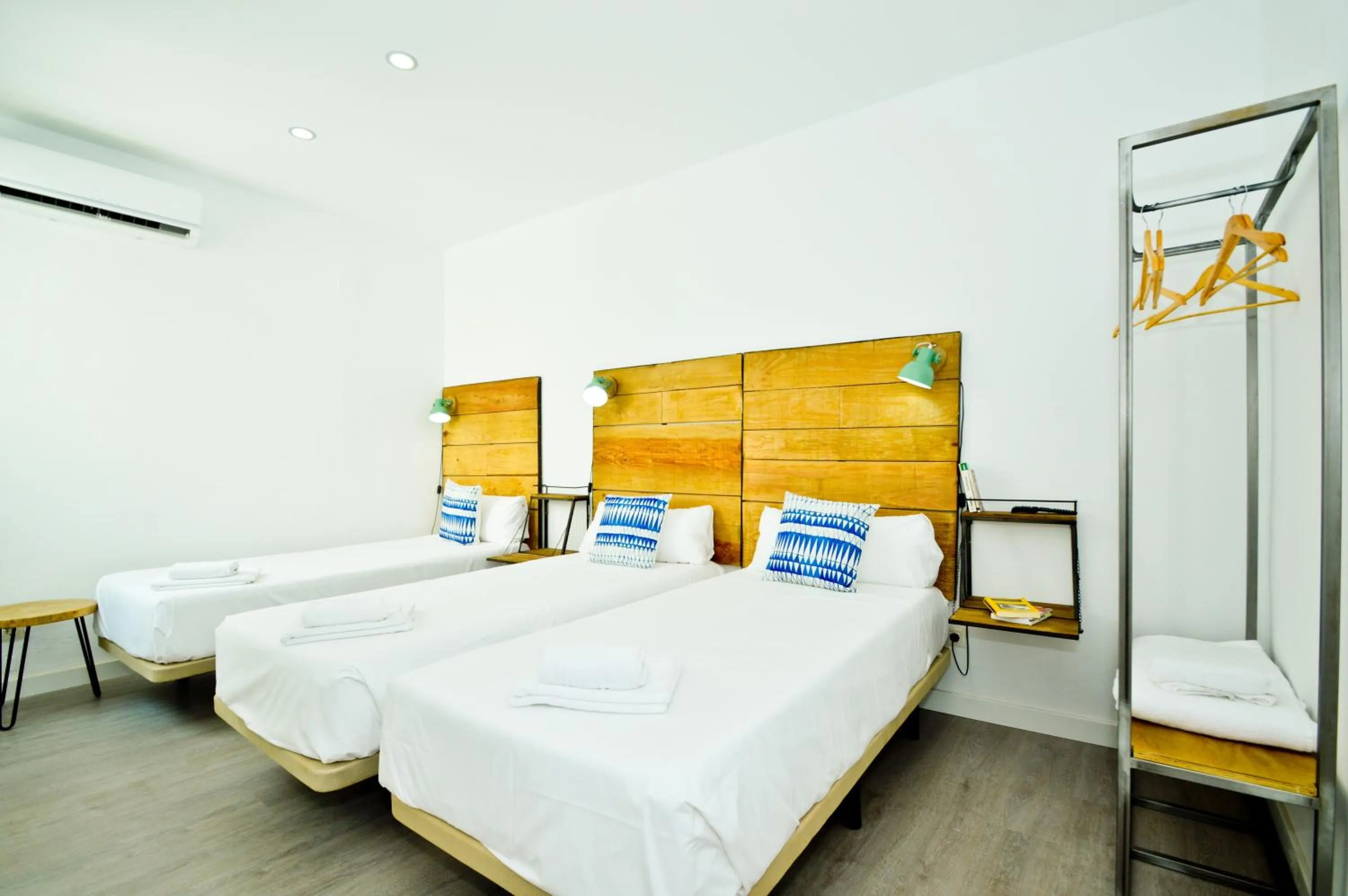 Bed in The Zentral Suites & Apartments