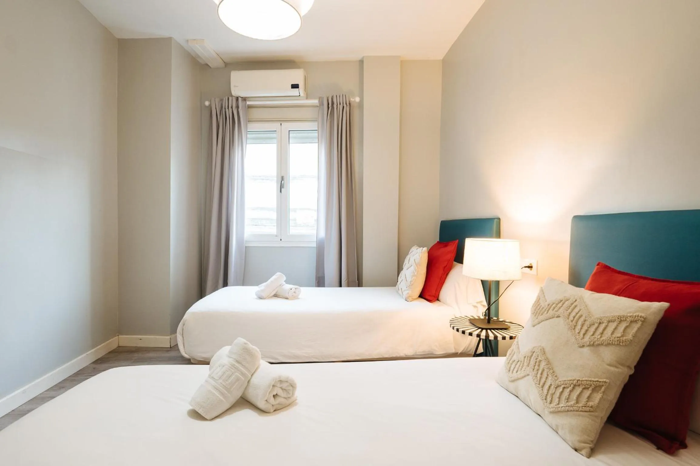 Bed in The Zentral Suites & Apartments