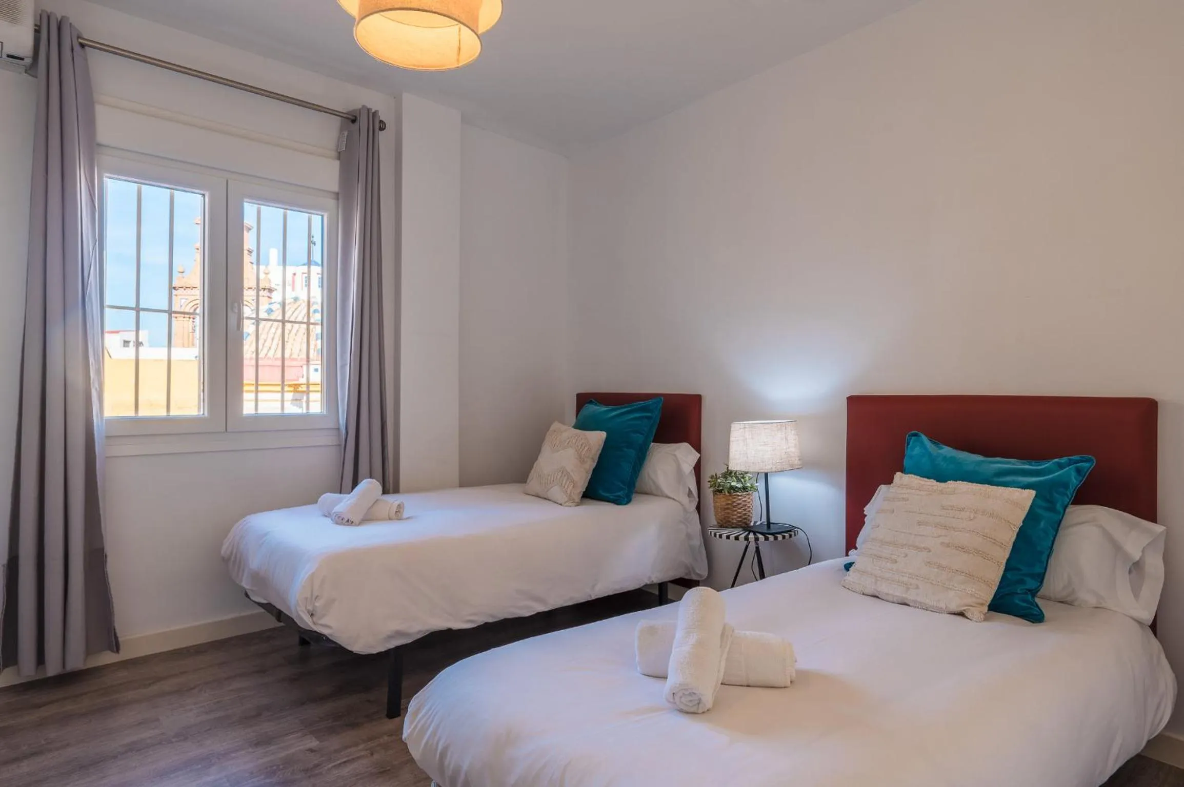 Bed in The Zentral Suites & Apartments