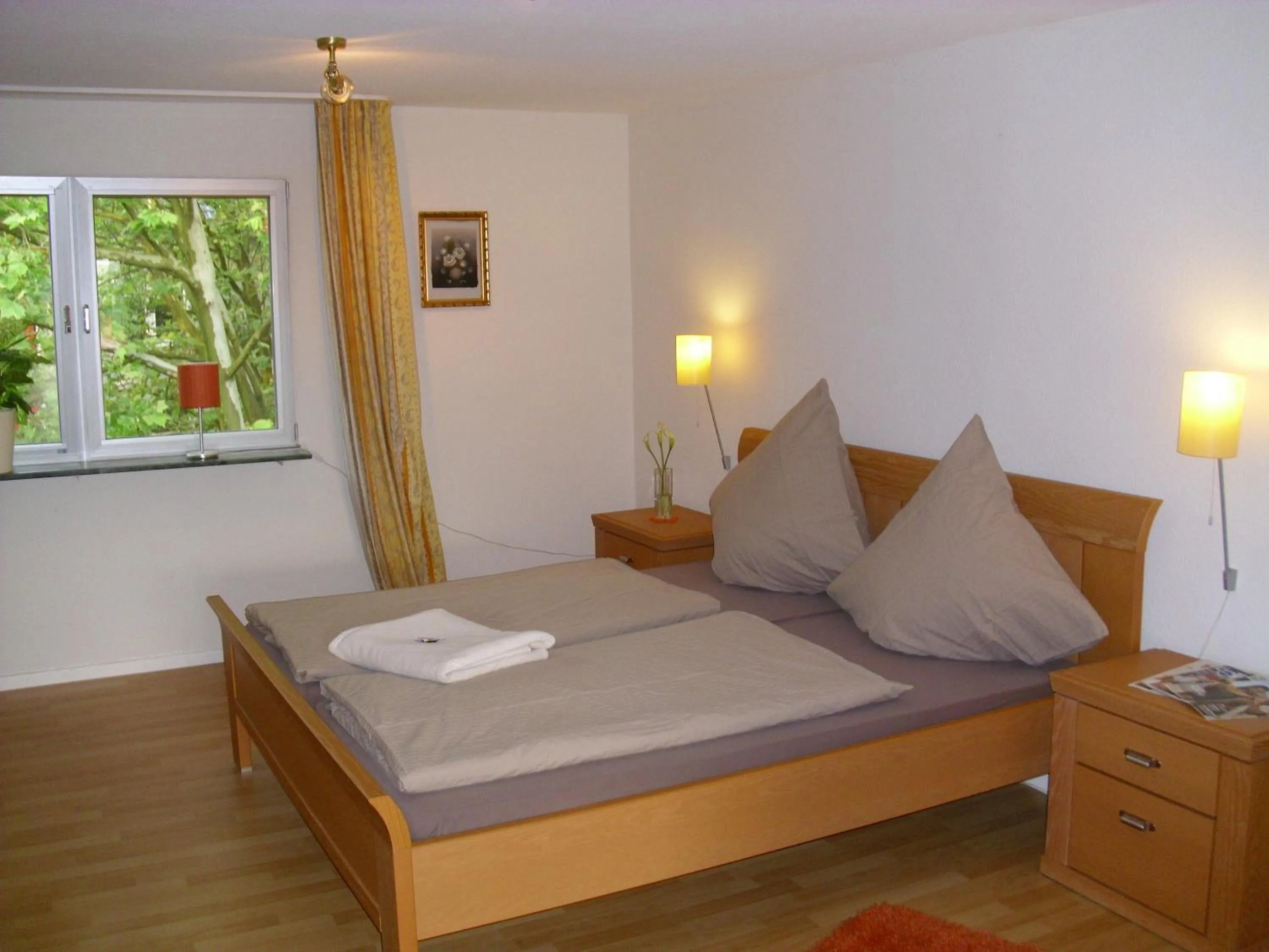 Bed in Messewohnung Augusta