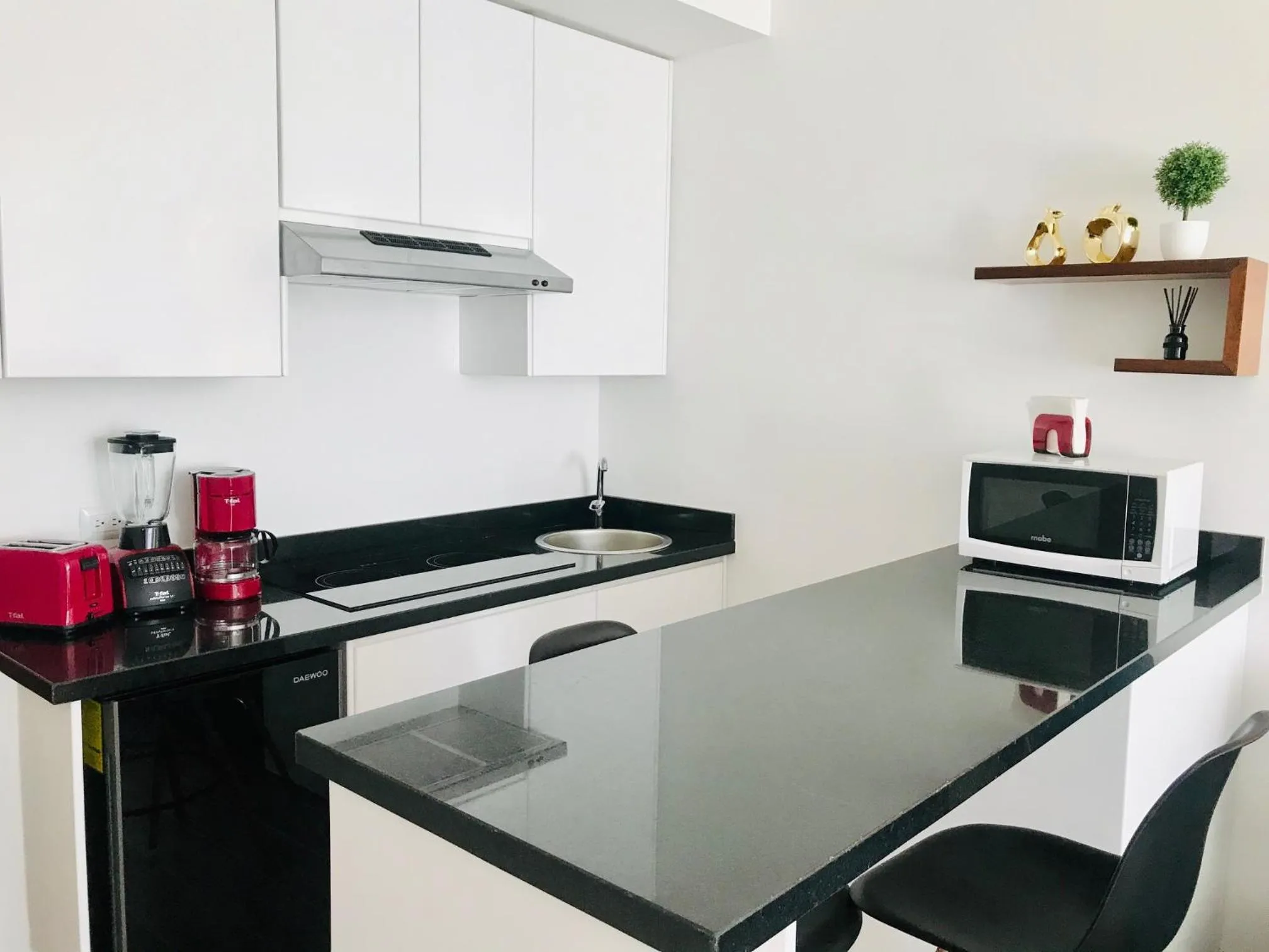 Kitchen or kitchenette in Edificio Vanessa 24 studios