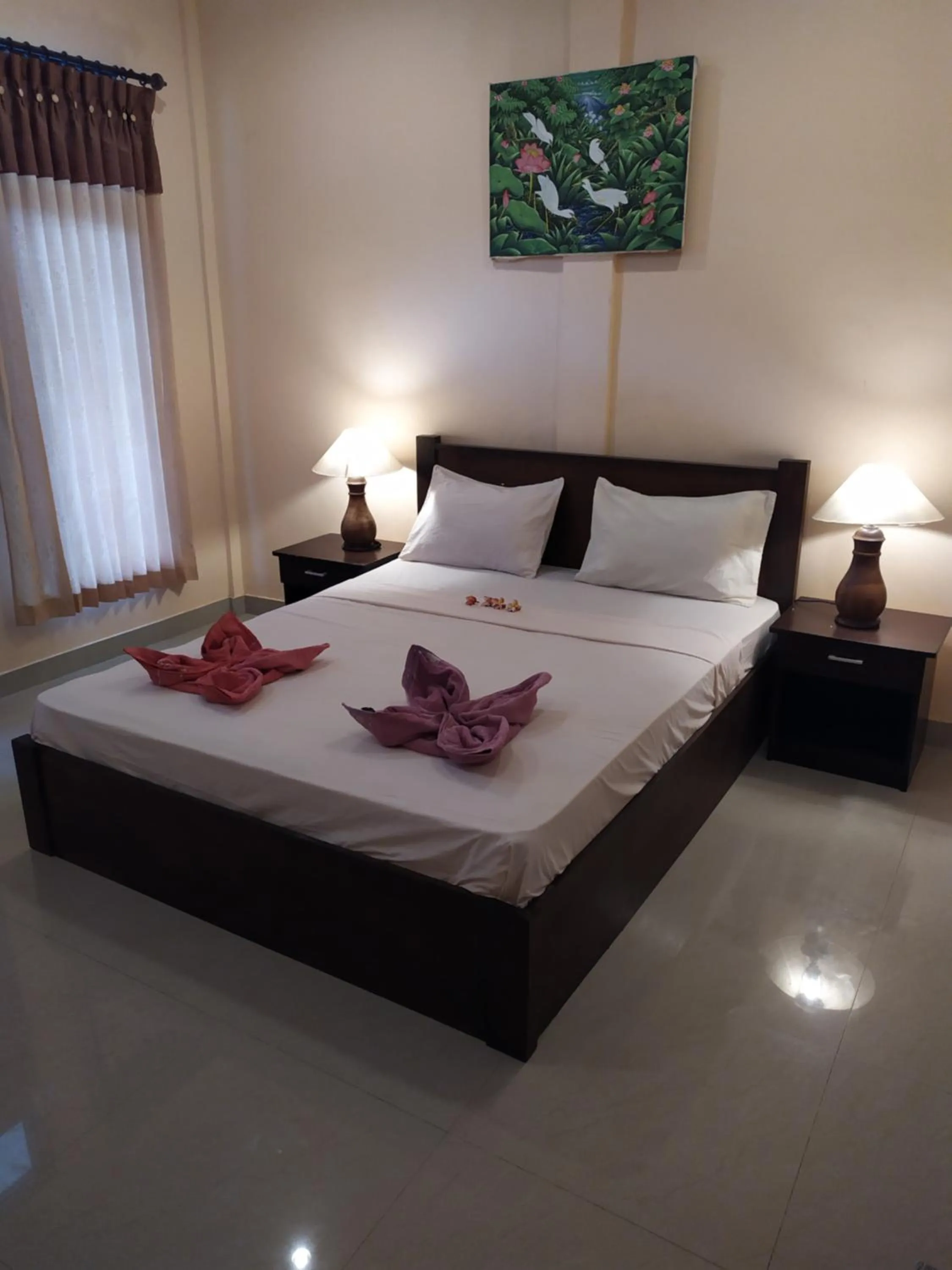 Bed in Kusuka Bungalow