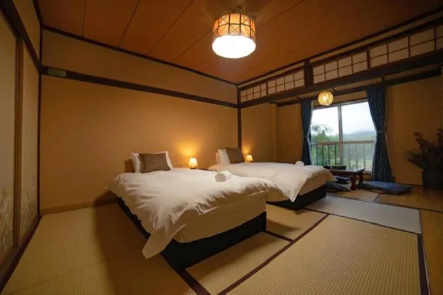 Bed in HA-MON Slope Side Hotel and Private Chalet