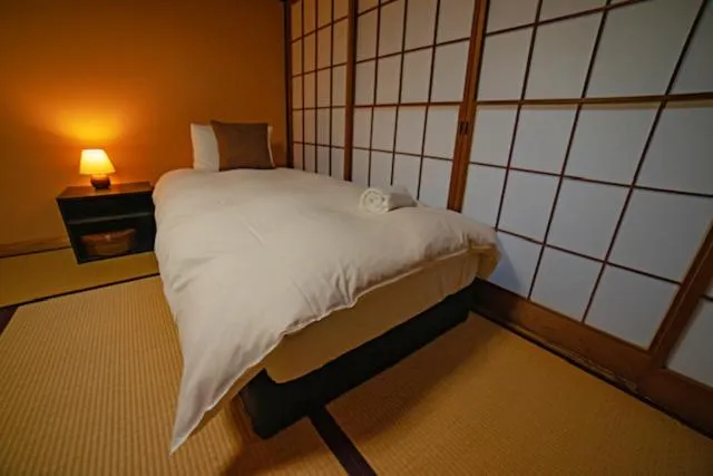 Bed in HA-MON Slope Side Hotel and Private Chalet