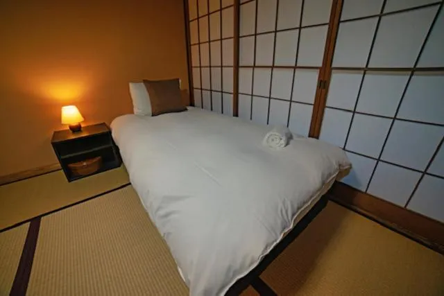 Bed in HA-MON Slope Side Hotel and Private Chalet