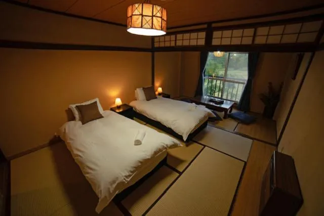 Bed in HA-MON Slope Side Hotel and Private Chalet