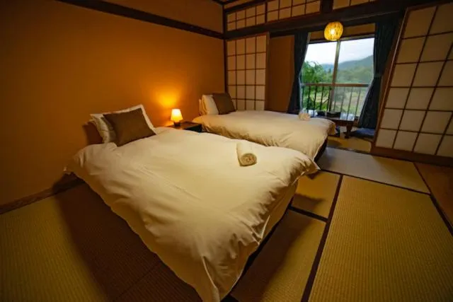 Bed in HA-MON Slope Side Hotel and Private Chalet