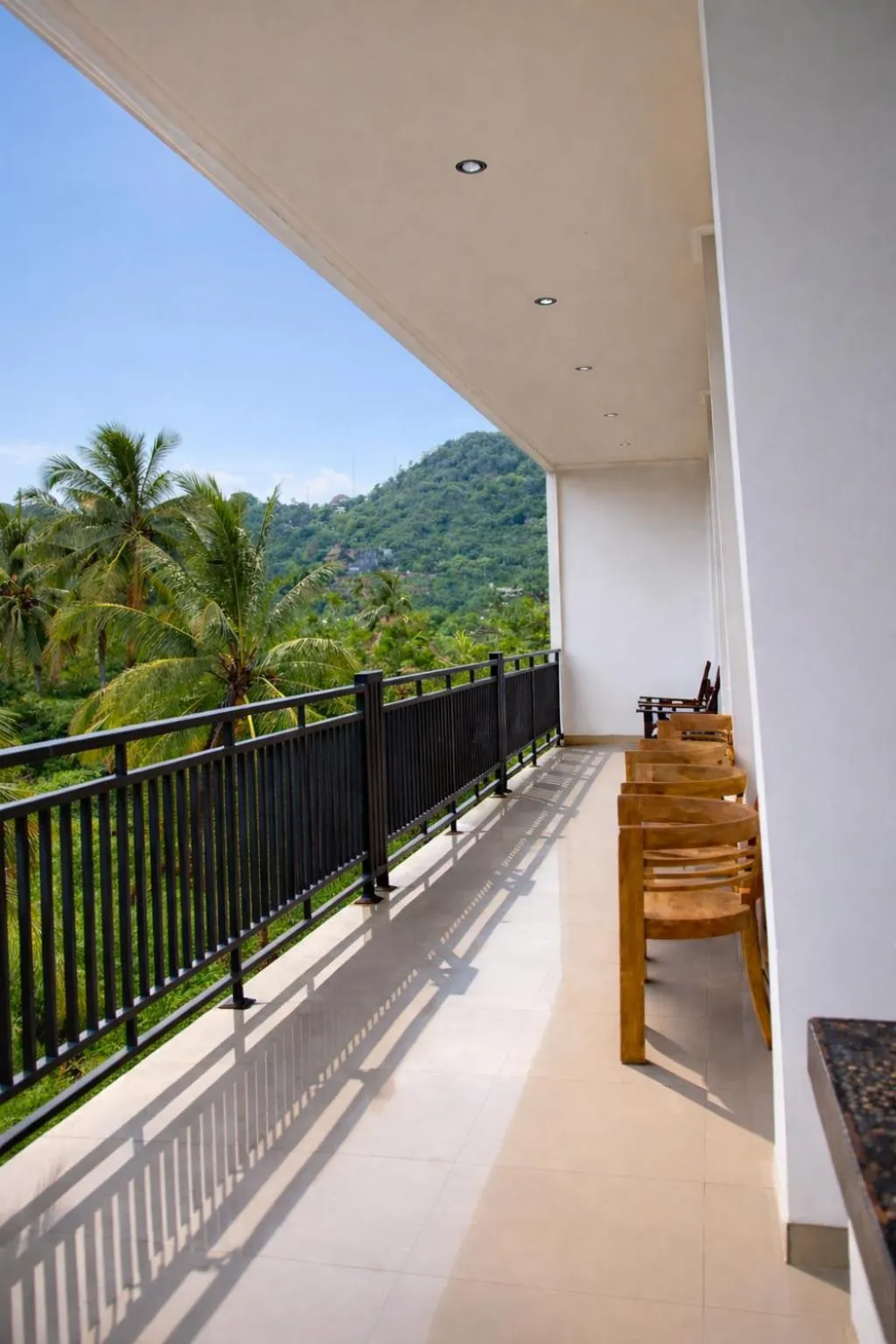 Balcony/Terrace in Grand Kuta Hotel Lombok - Pool - 43 inch Google TV - Strong 60Mbps WiFi - New Enhanced Management