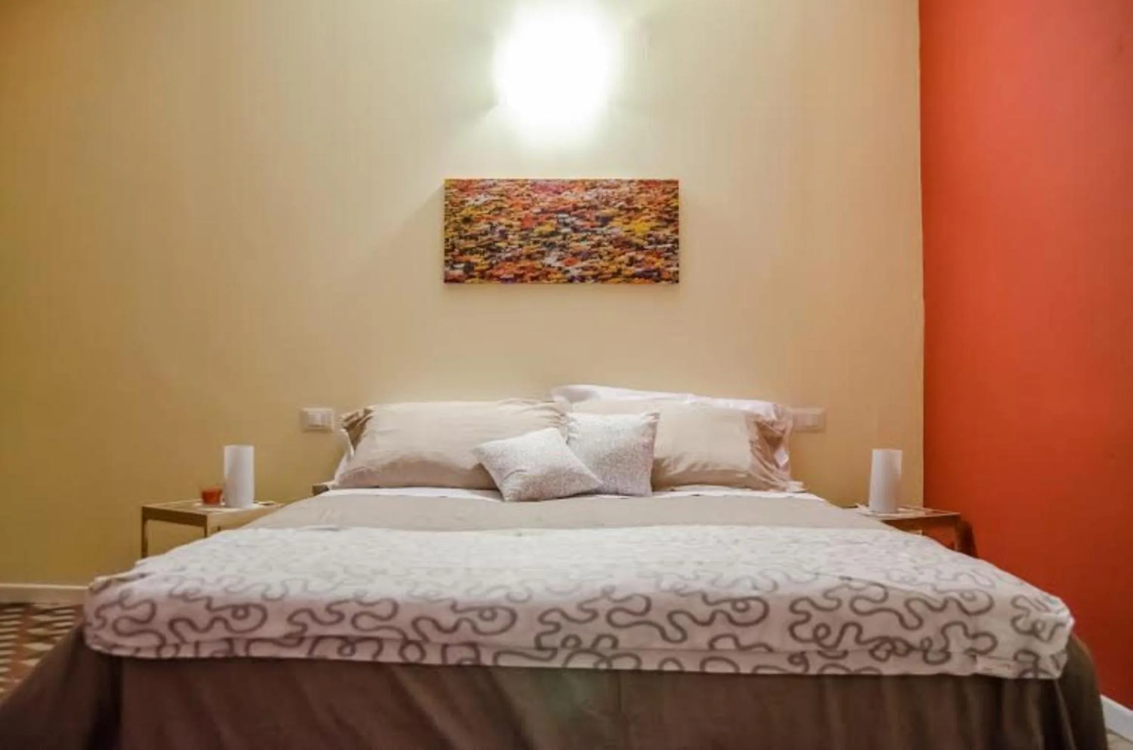 Bed in B&B Il Tempo Del Vento in front of the Castle