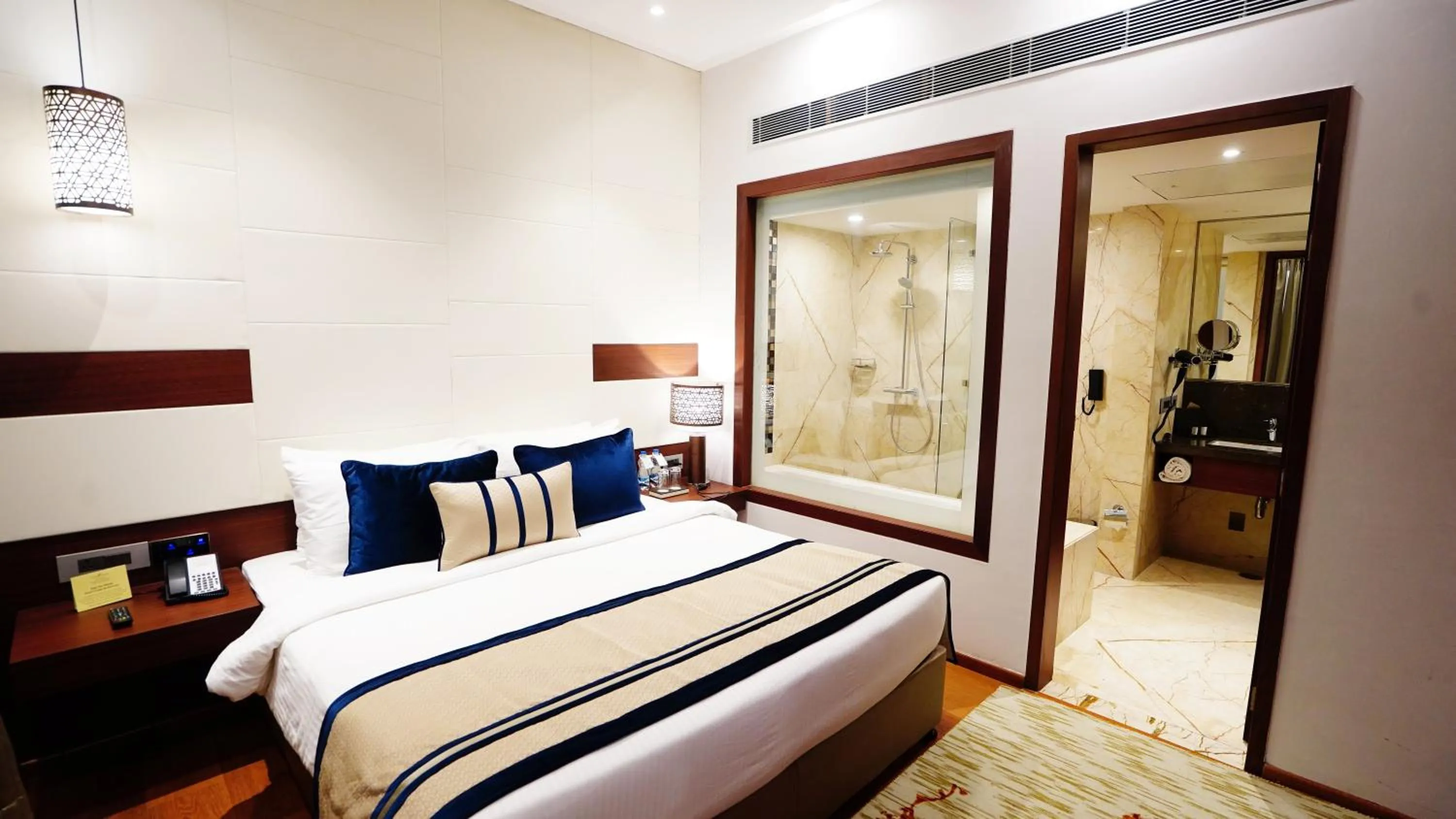 Bed in The Fern Residency Sarnath