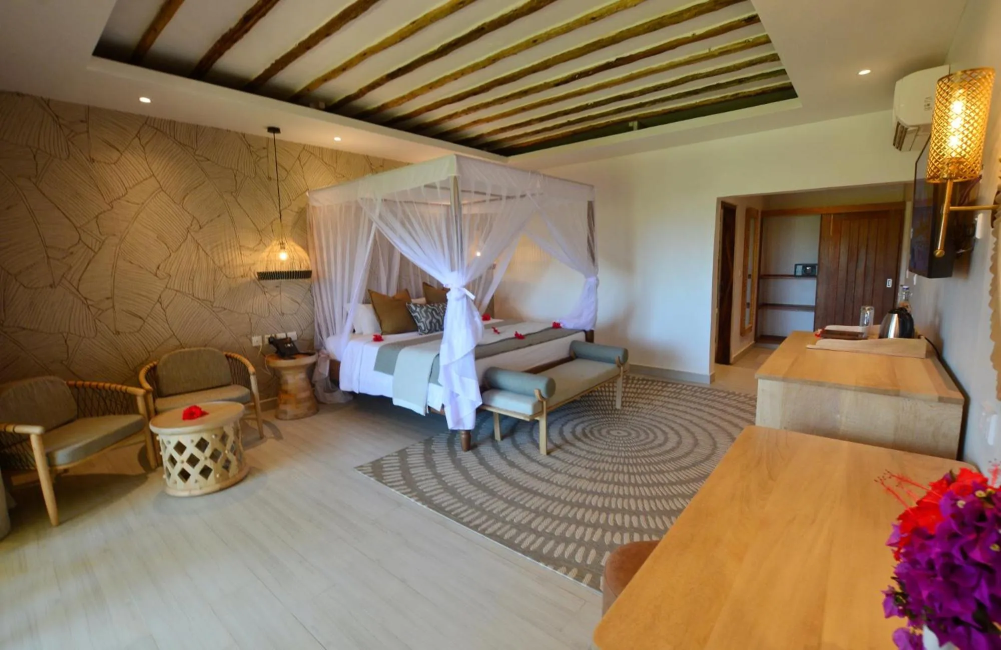 Bed in Neptune Pwani Beach Resort & Spa Zanzibar - All Inclusive