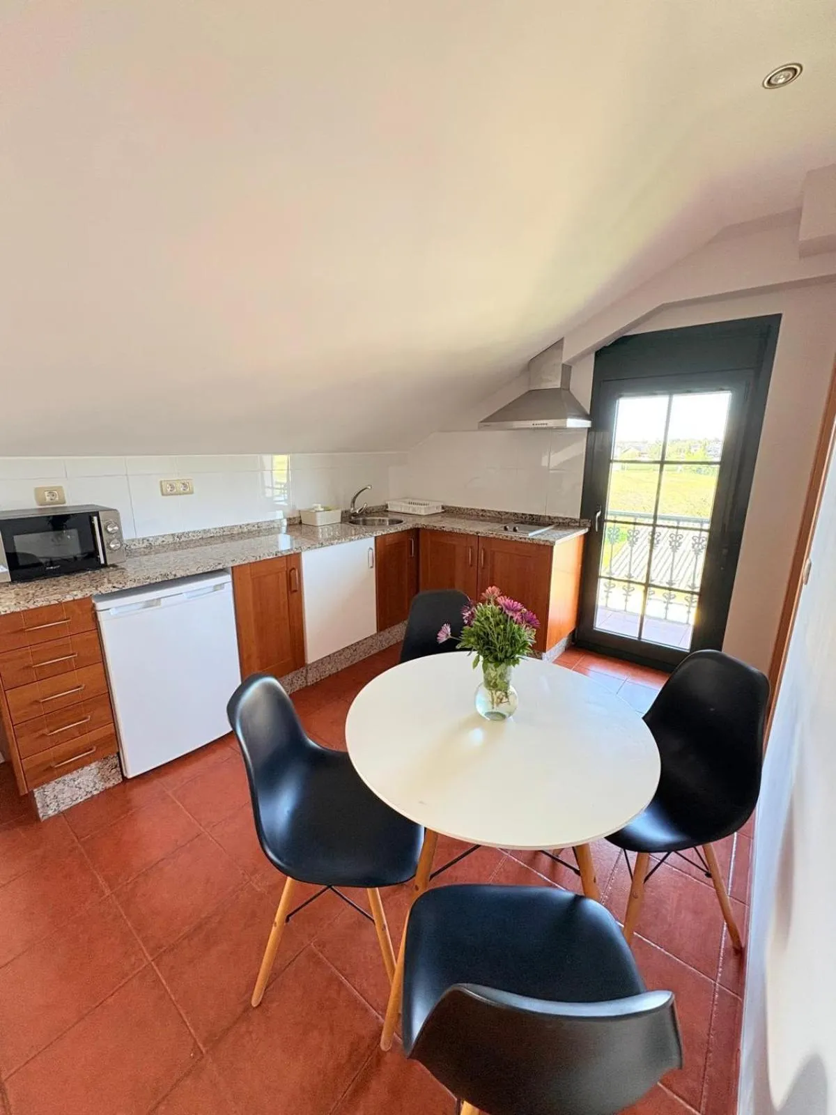 Kitchen or kitchenette in Apartamentos Luarca