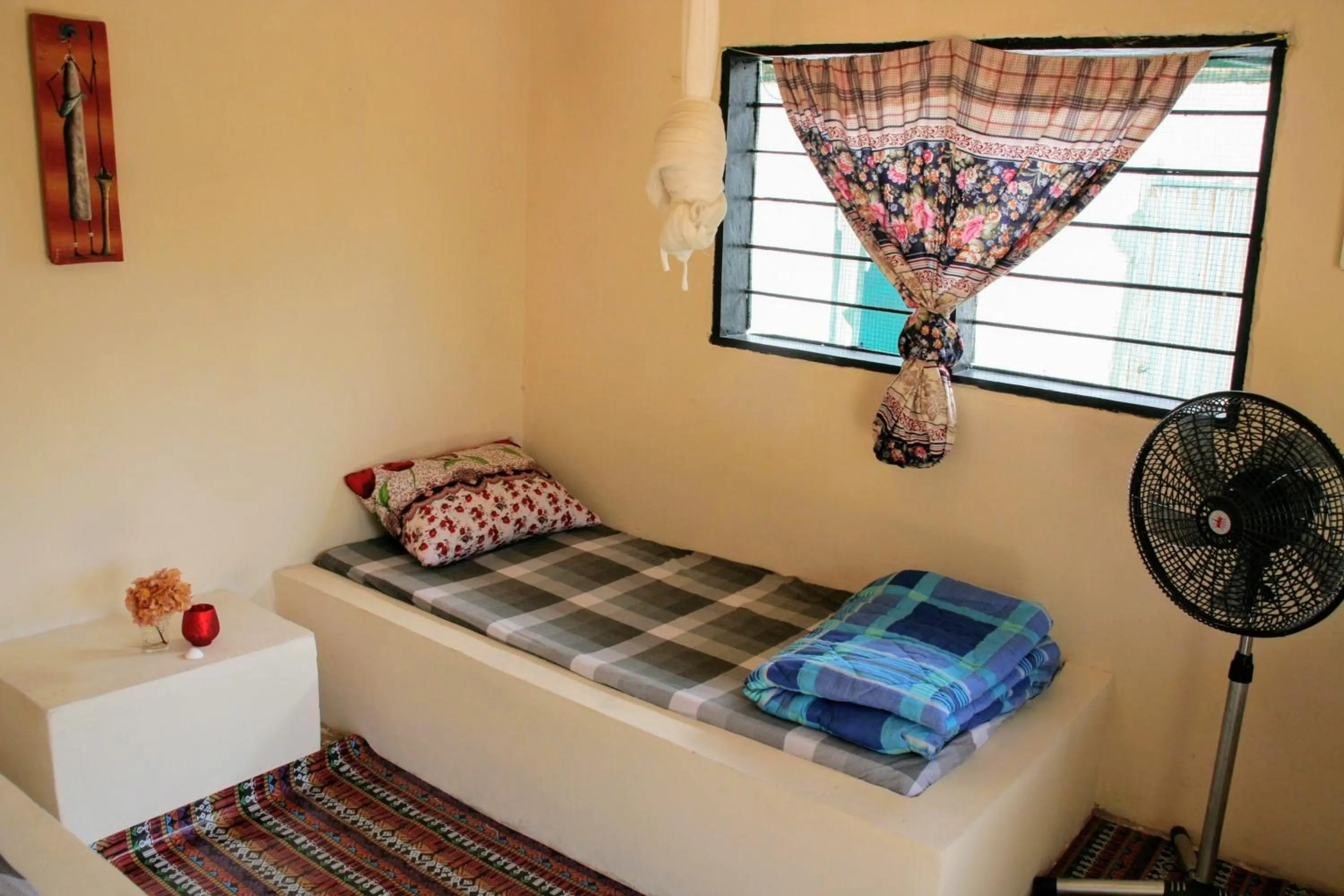 Bed in Tamba Kuruba Eco-lodge