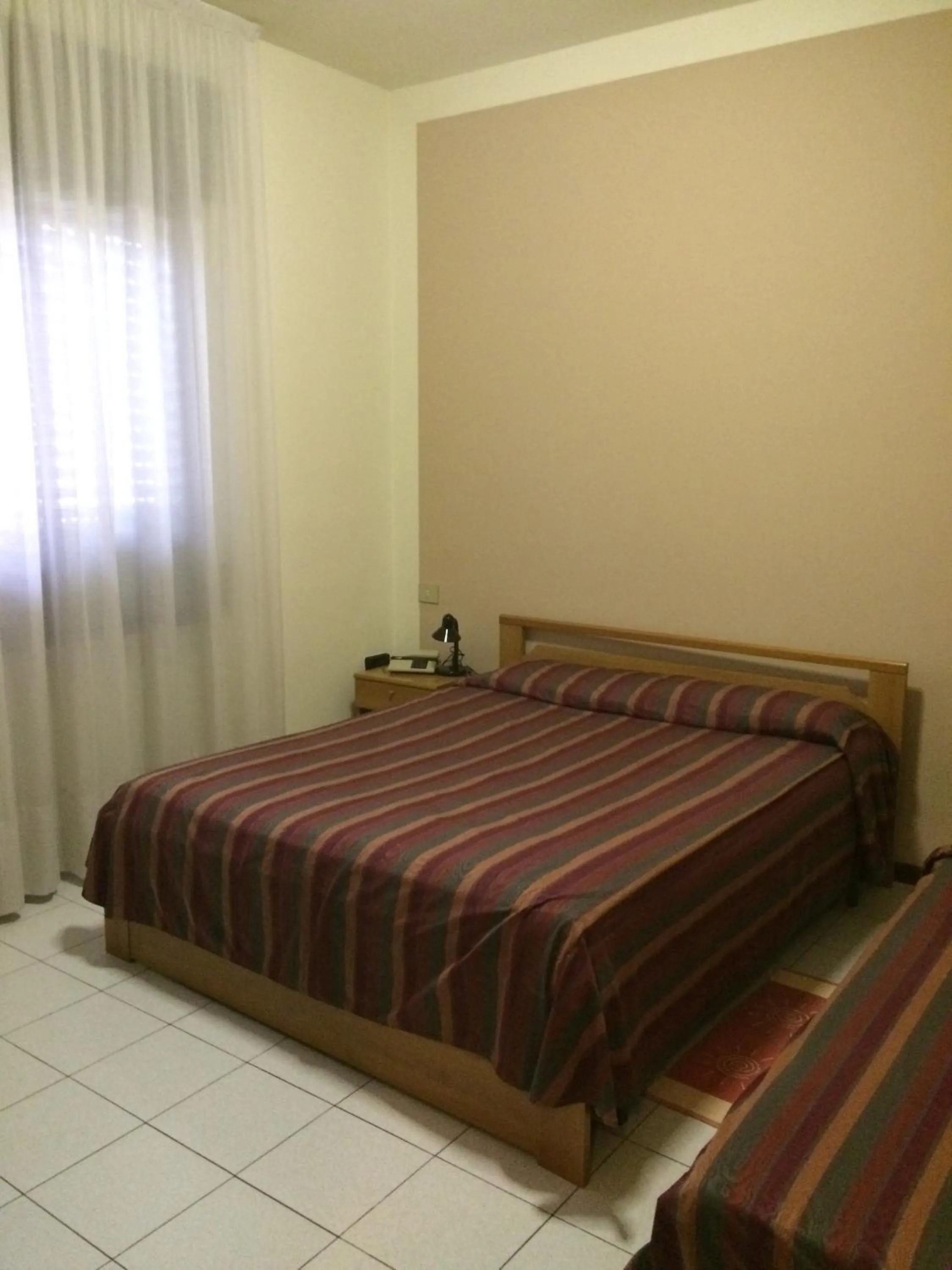 Bed in Albergo Cristallo