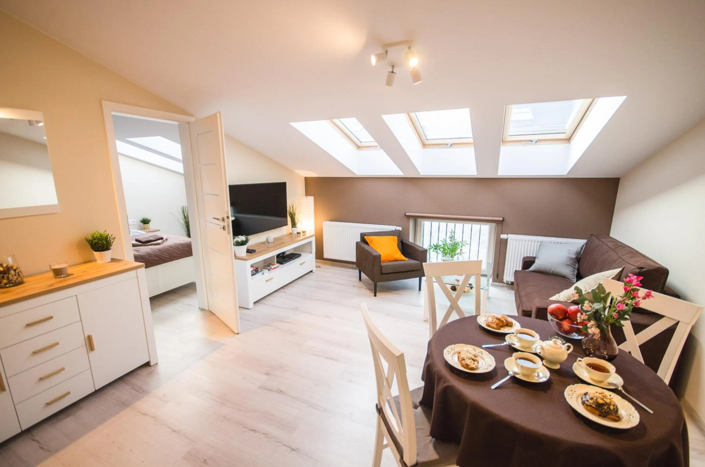 Communal lounge/ TV room in Old Town Vistula Premium Apartments