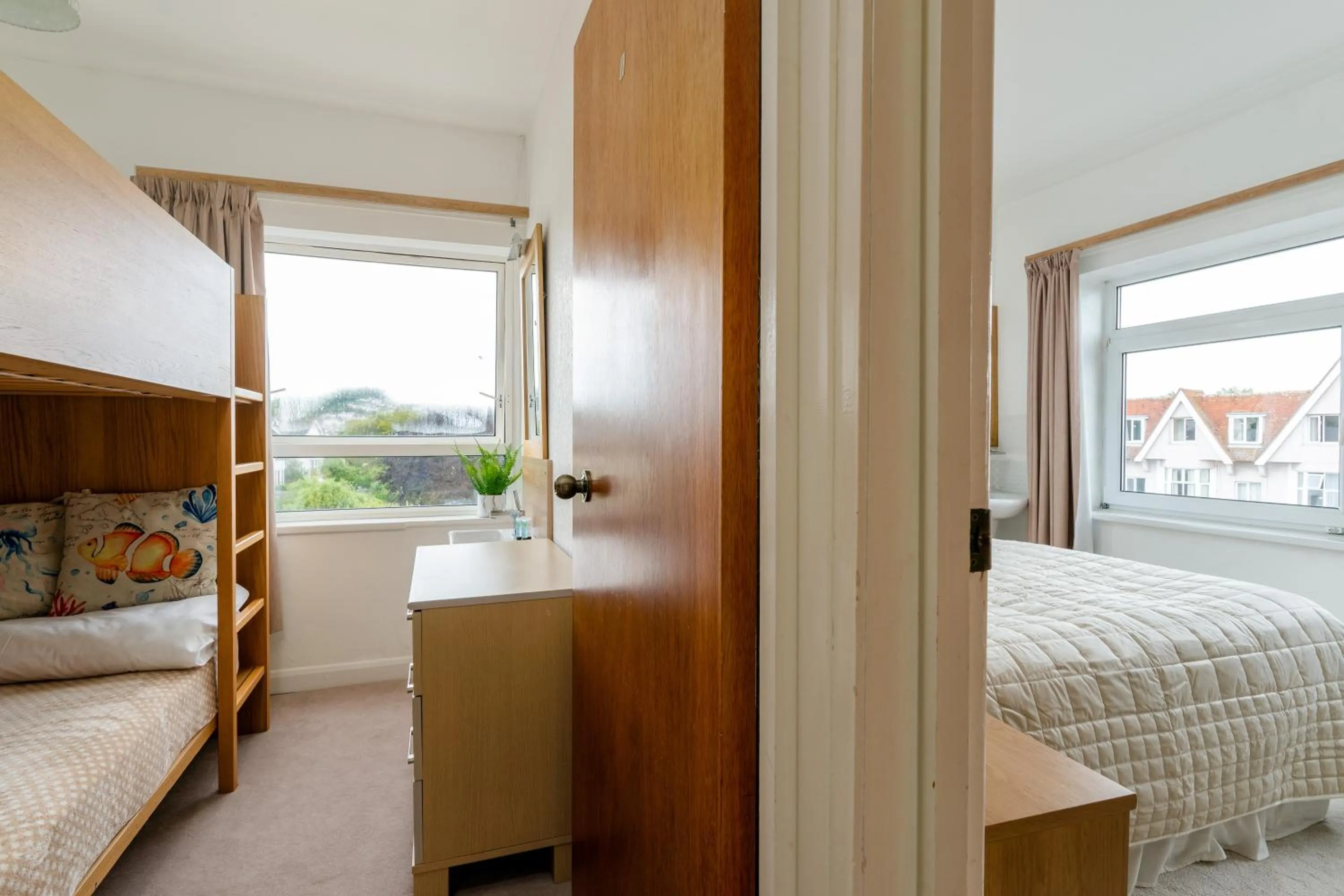 Living room, Bed in The Torland - Paignton Seafront - free parking, all rooms en-suite