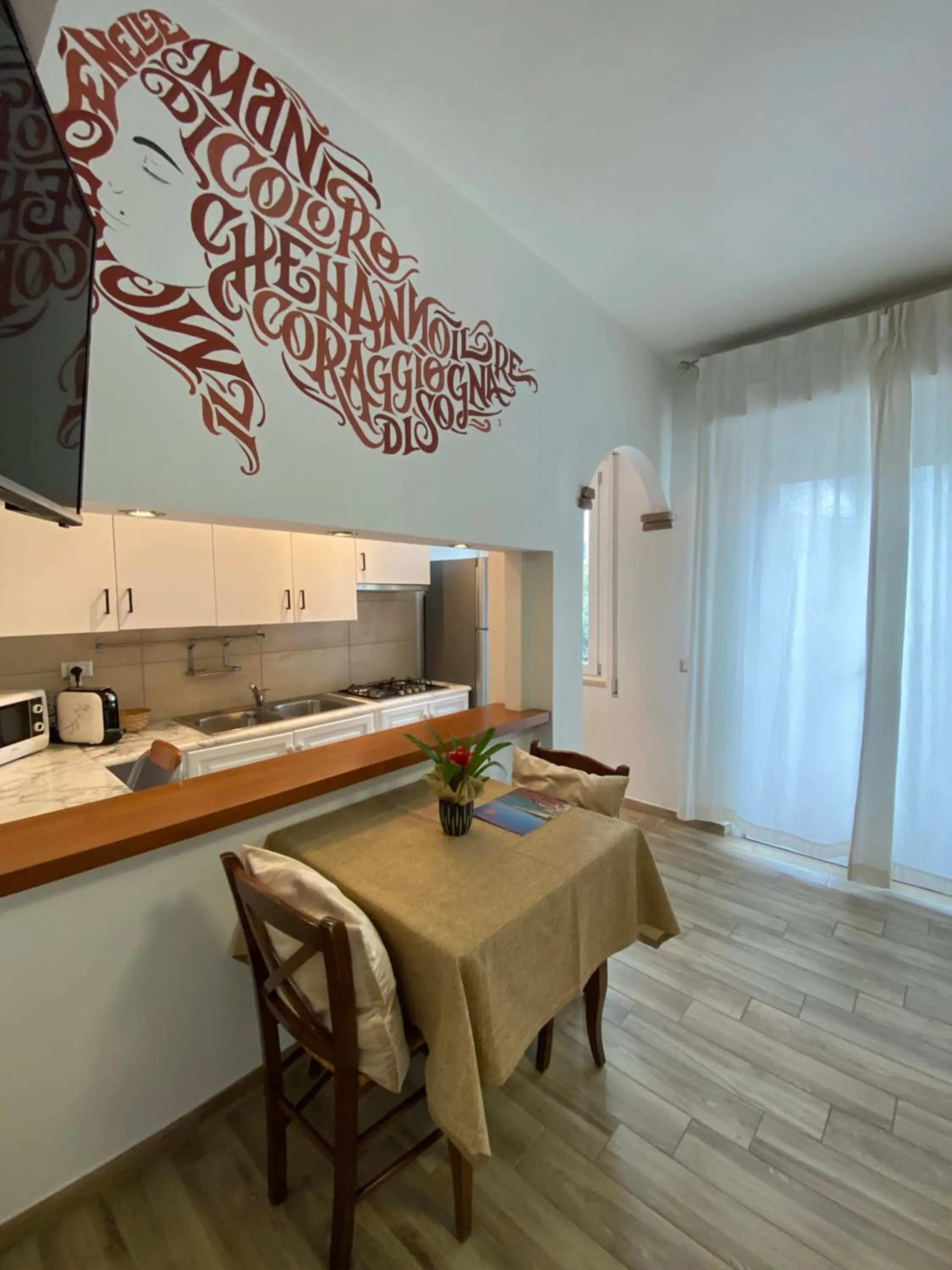 Kitchen or kitchenette in Locanda degli Artisti